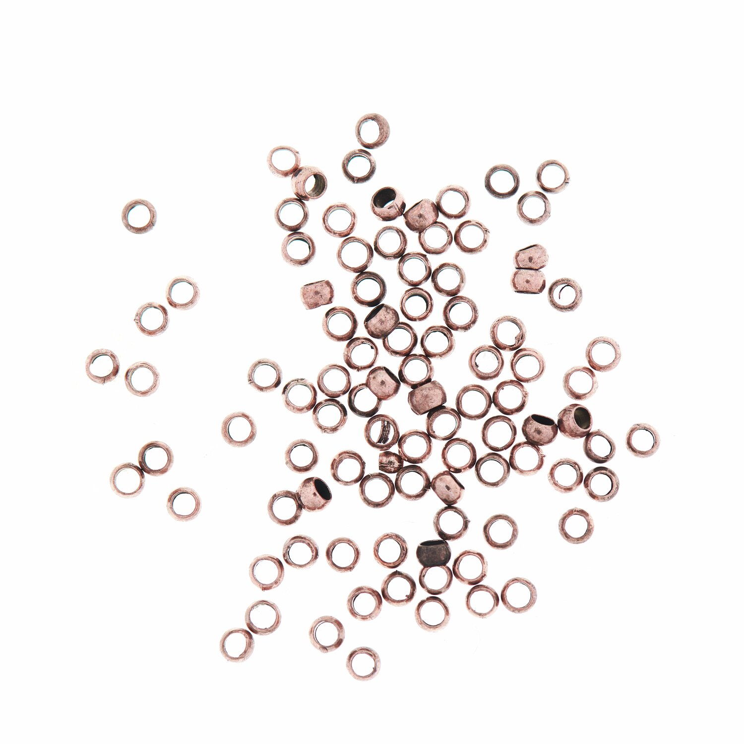 QuetschPerle kupferfarbig 2mm 100 Stück von Rico Design. Kupferfarbene Perlen auf weißem Hintergrund. Ideal für Schmuckherstellung.