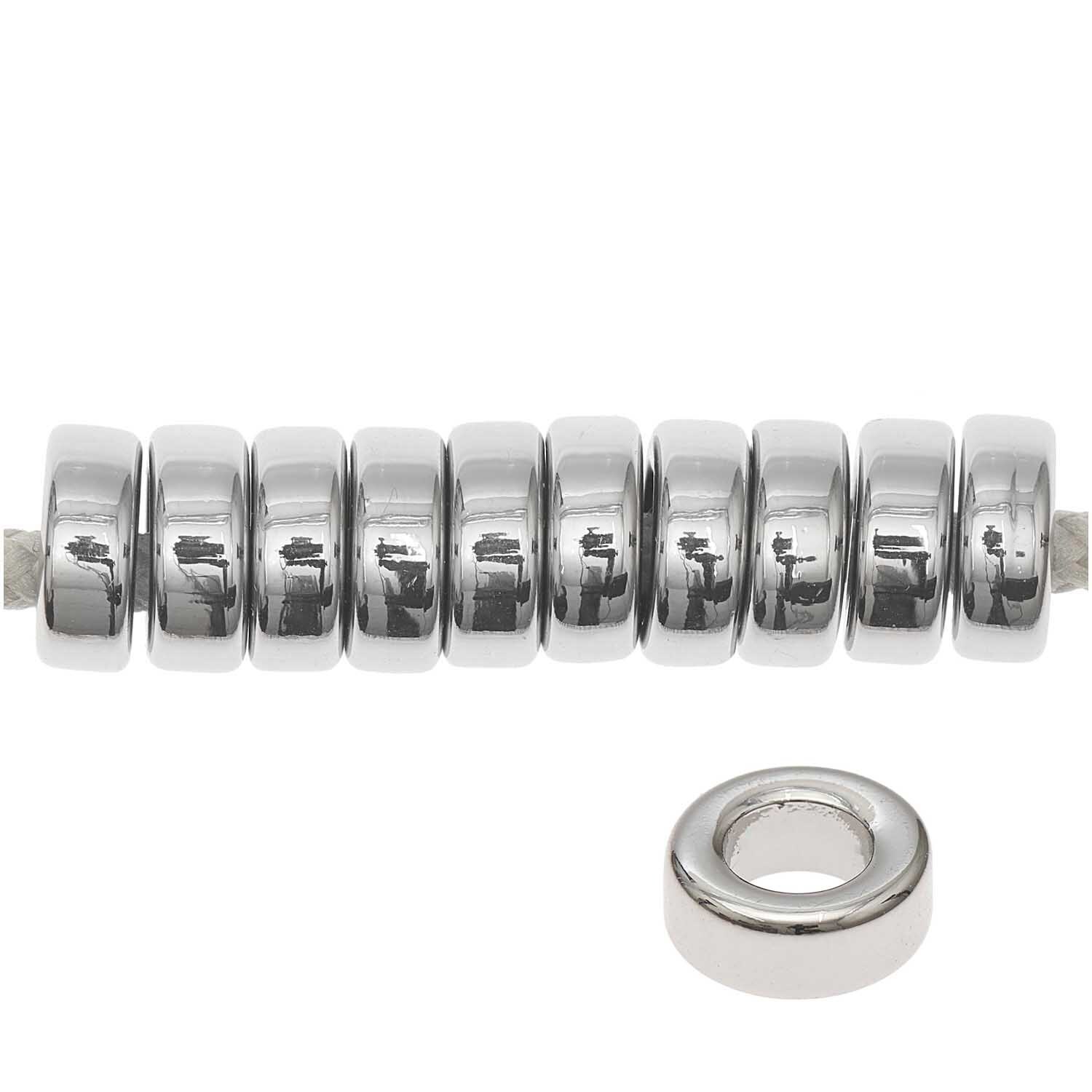 Itoshii - Ponii Beads Ringe, 9x3,5mm, 10 Stück, von Rico Design. Zehn silberne Ringe in einer Reihe.