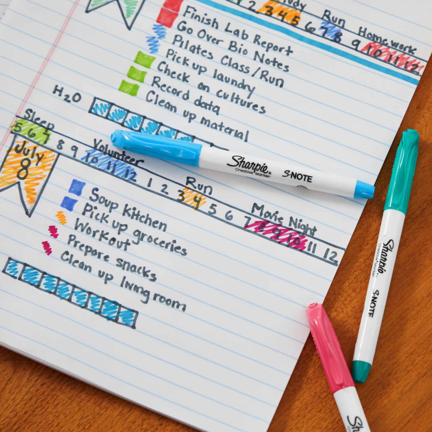 Marker S-Note 12 Stück auf einem Notizbuch mit farbigen Markierungen und Aufgabenlisten.
