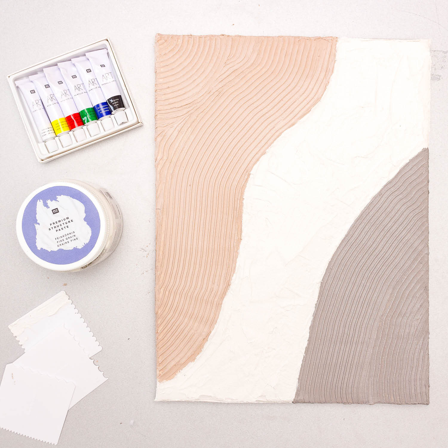 Anleitung Leinwand mit Strukturpaste und Acrylfarben gestalten von idee. Creativmarkt 