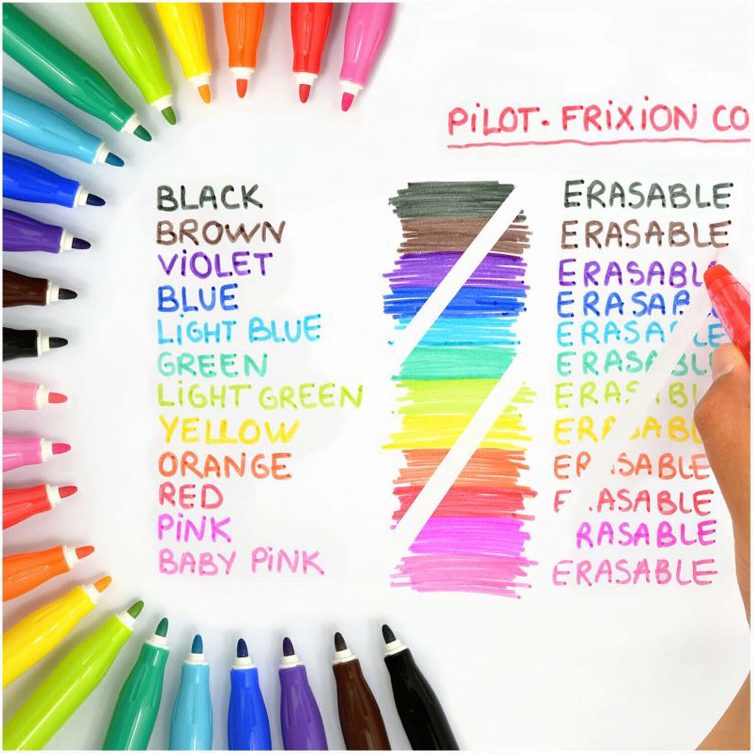 Frixion Color Filzstifte in 12 Farben, angeordnet in einem Kreis, mit einer Hand, die einen Stift hält.