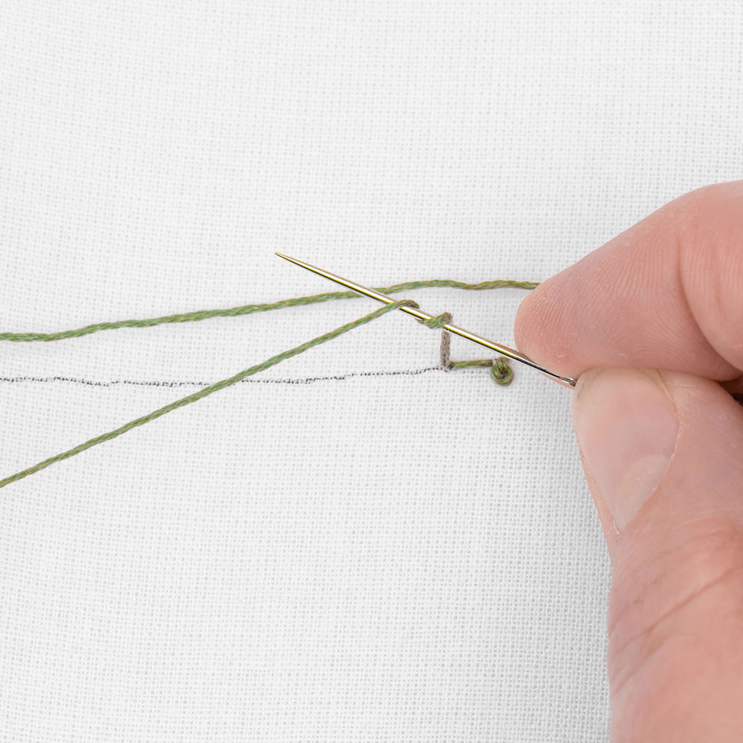 Schritt 7 in der Stickanleitung für einen Korallenstich
