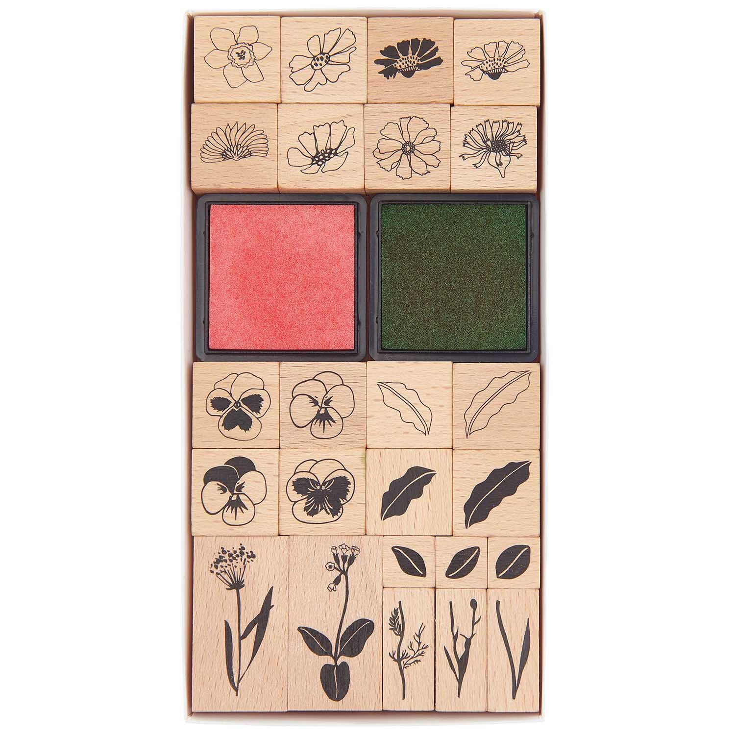 Paper Poetry Stempelset Futschikato Blumen, 26-teilig, mit floralen Motiven und zwei Stempelkissen in Rot und Grün von Rico Design.