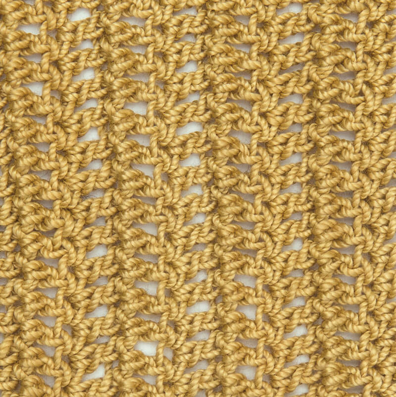 Häkelgarn von Wolle Rödel in einem gestrickten Muster, das die Textur und Qualität des Garns zeigt. Ideal für kreative Projekte.