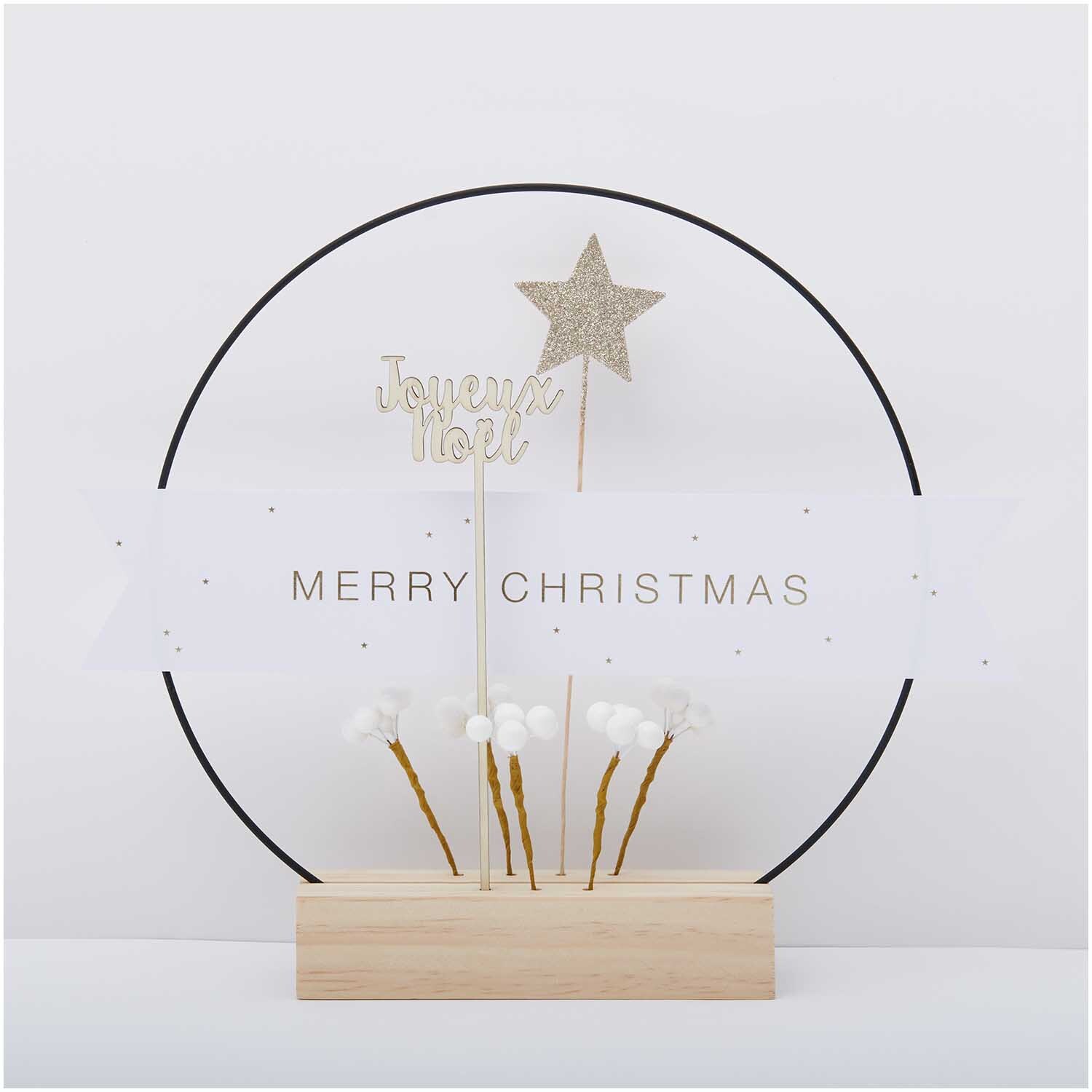 Glitter-Picker Stern gefüllt 27x5cm von Rico Design, dekoriert mit "Merry Christmas" und weißen Blüten auf Holzsockel.