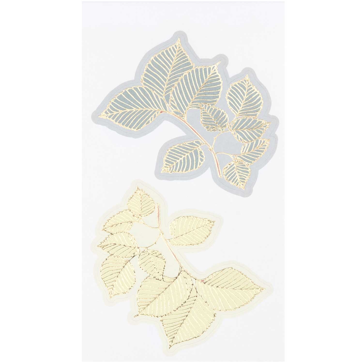 Paper Poetry Sticker Blüten 4 Blatt: Zwei filigrane Blättersticker in Gold auf hellem Hintergrund.