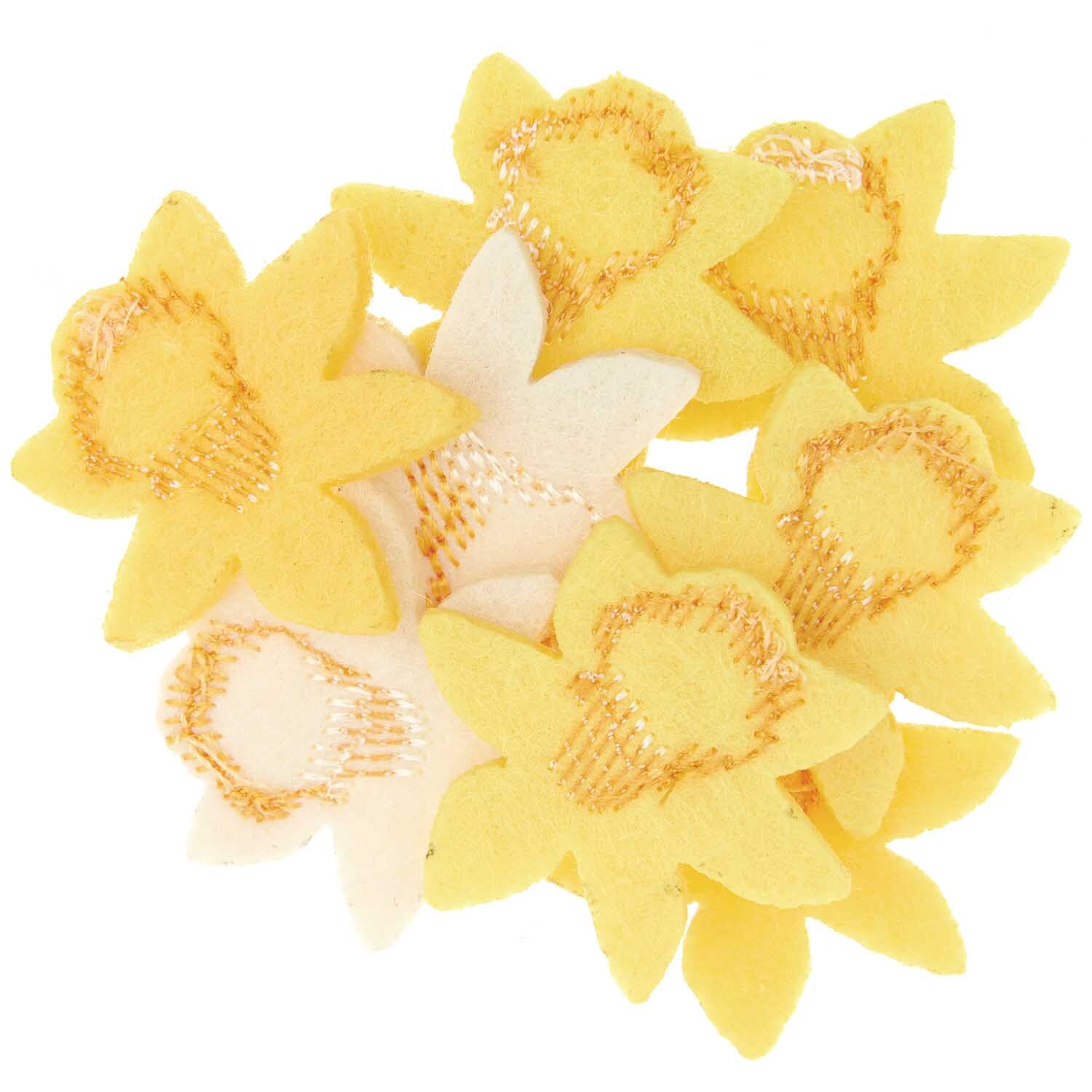 Filzstreu Narzissen bestickt Gelb: Acht gelbe Filzblumen von Rico Design, dekorativ bestickt.
