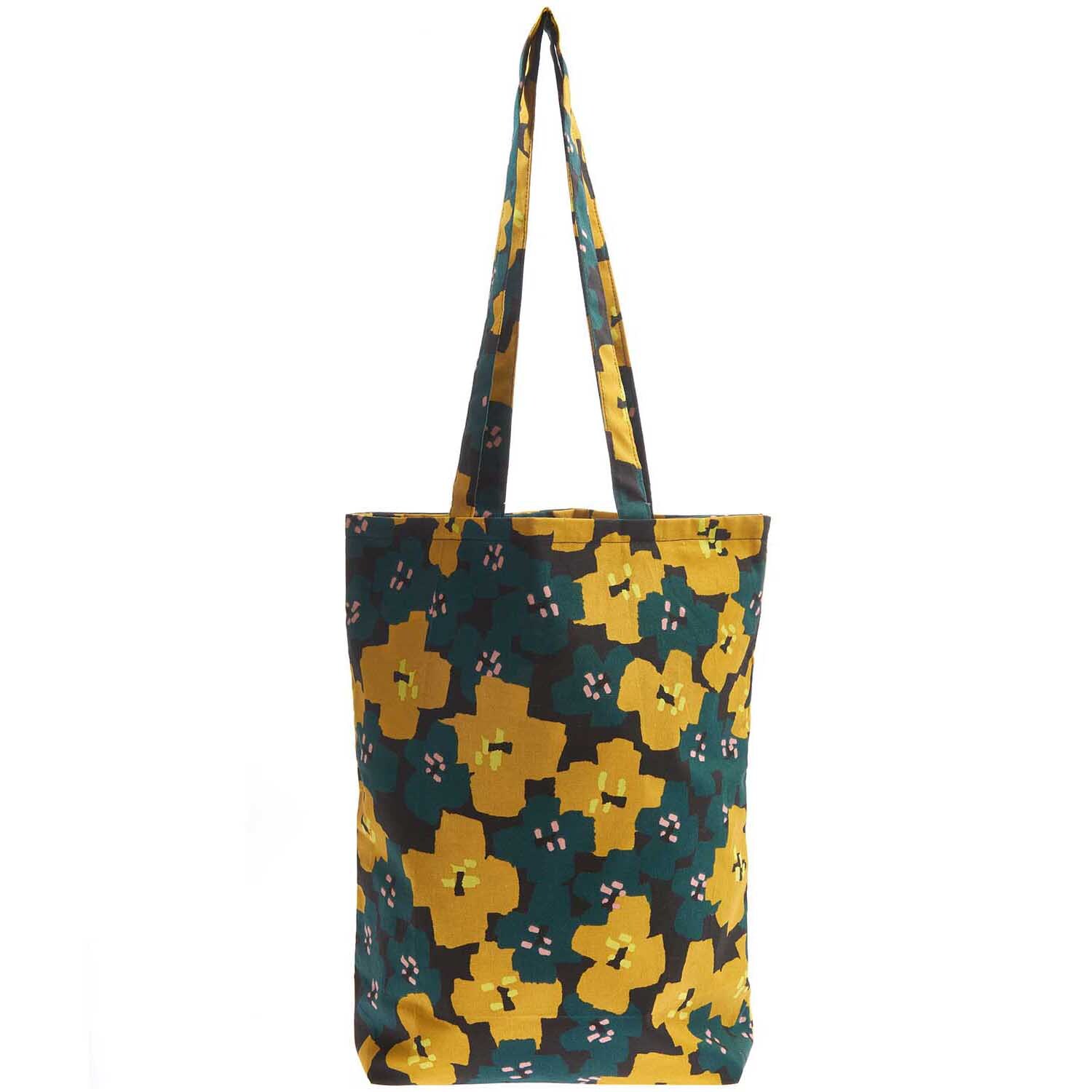 Shopper Okina Hana mit gelbem Blumenprint auf dunkelgrünem Hintergrund, Marke Rico Design.