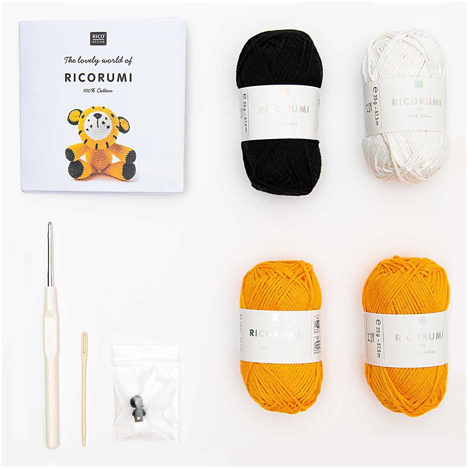 Häkelset Ricorumi Puppies Tiger: Komplettes Set mit Garnen in Schwarz, Weiß und Orange, Häkelnadel und Anleitung von Rico Design.