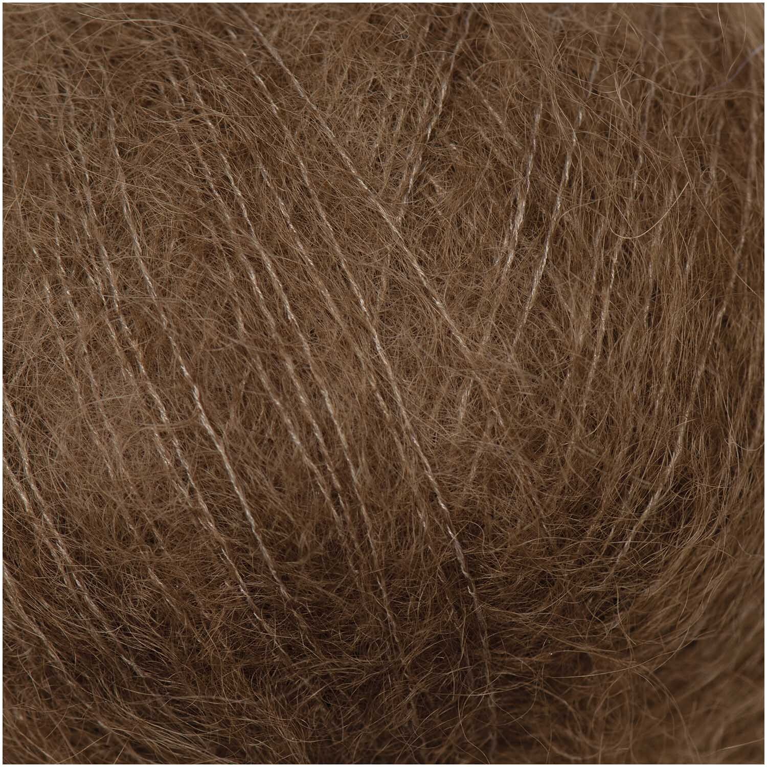 Essentials Super Kid Mohair Loves Silk, weiches Garn in Oliv von Rico Design, ideal für leichte Strickprojekte.