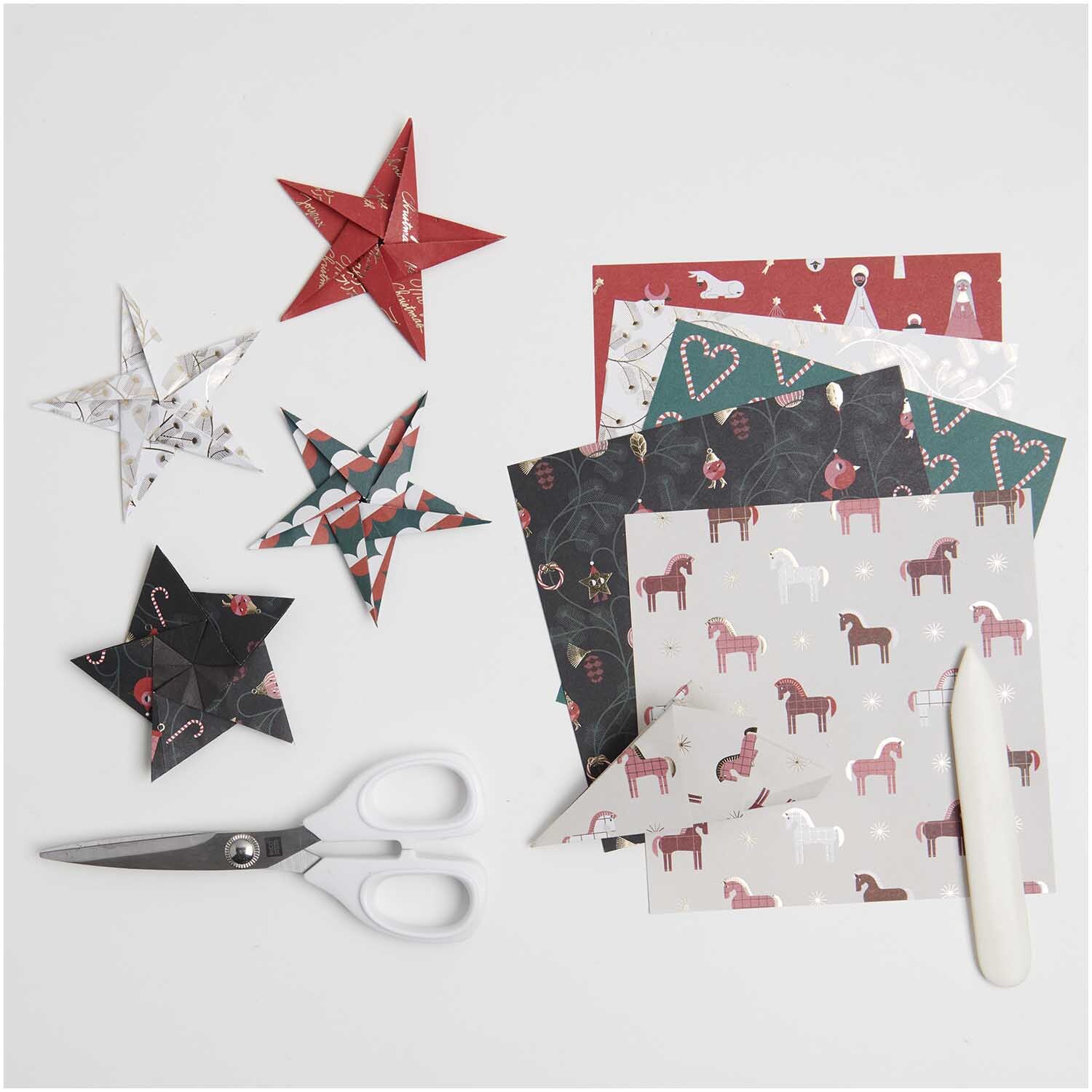 Paper Poetry Origami Christmas Rocks! 15x15cm 50 Blatt zeigt bunte Origami-Sterne und festliche Papierbögen mit Schere und Falzbein.
