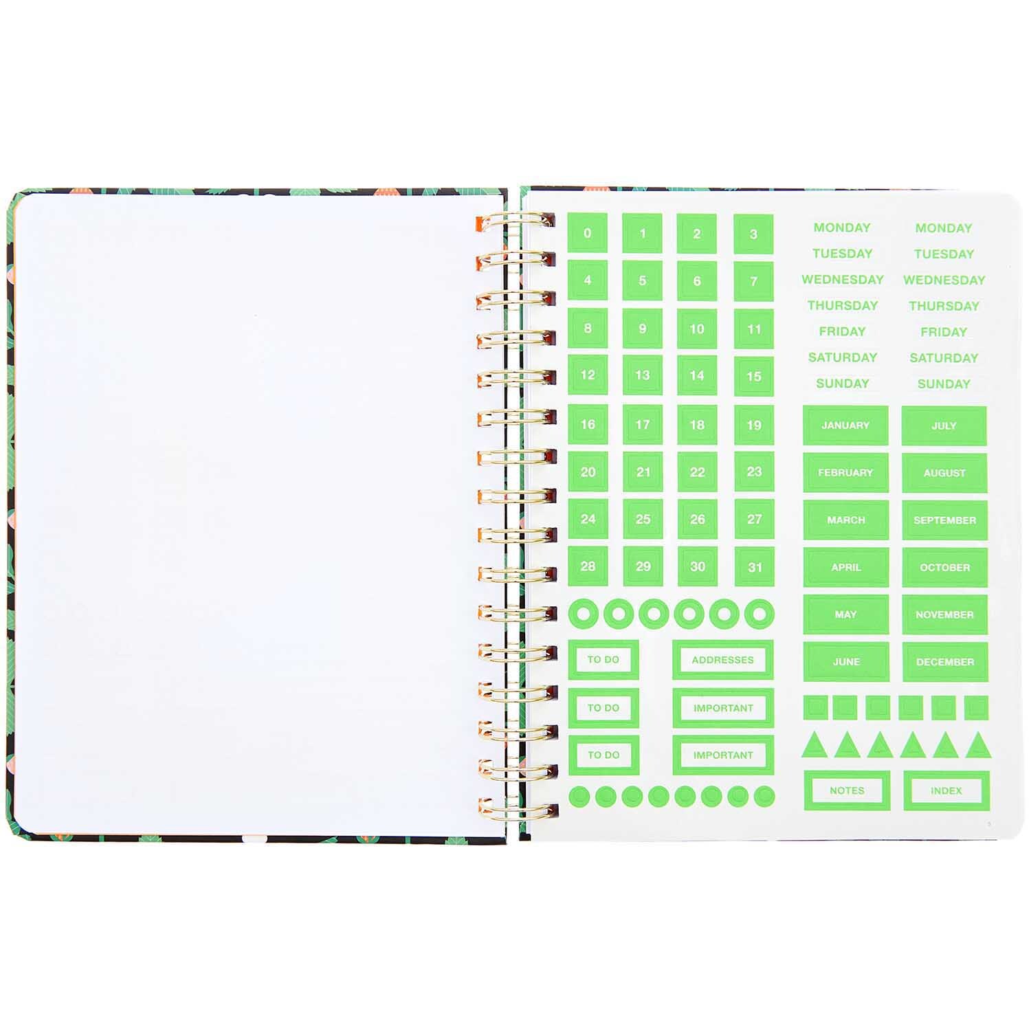 Paper Poetry Bullet Diary mit Spiralbindung und 164 Seiten, geöffnet mit grünen Aufklebern. Ideal für kreative Planung.