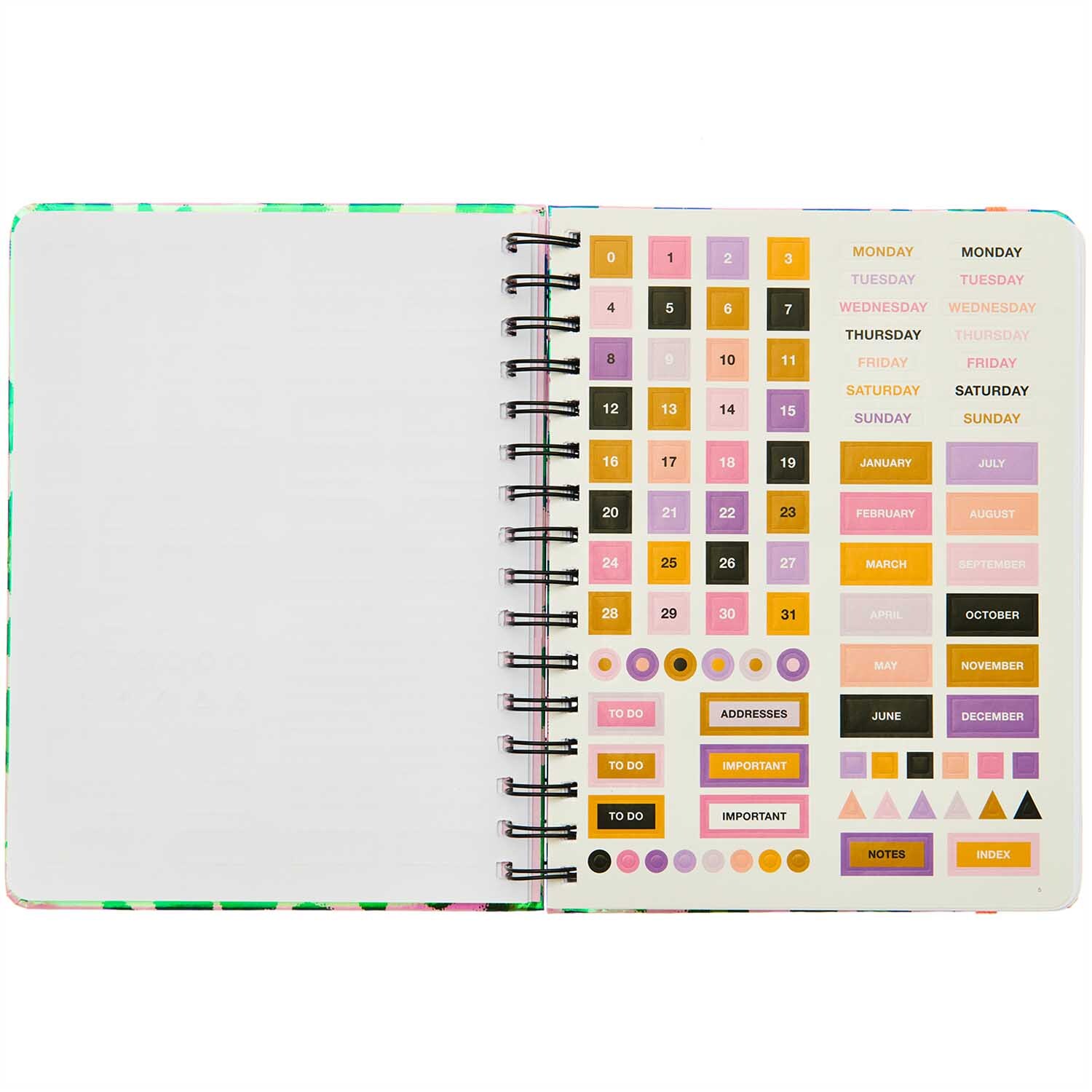 Paper Poetry Bullet Diary mit Spiralbindung, zeigt bunte Aufkleber und leere Seiten für kreative Planung. Ideal für Notizen und Termine.
