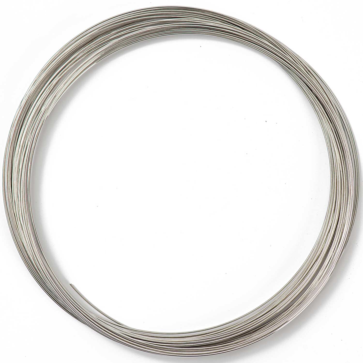 Kettenspiralfeder 30g aus silbernem Material von Rico Design, aufgerollt in einem Kreis.