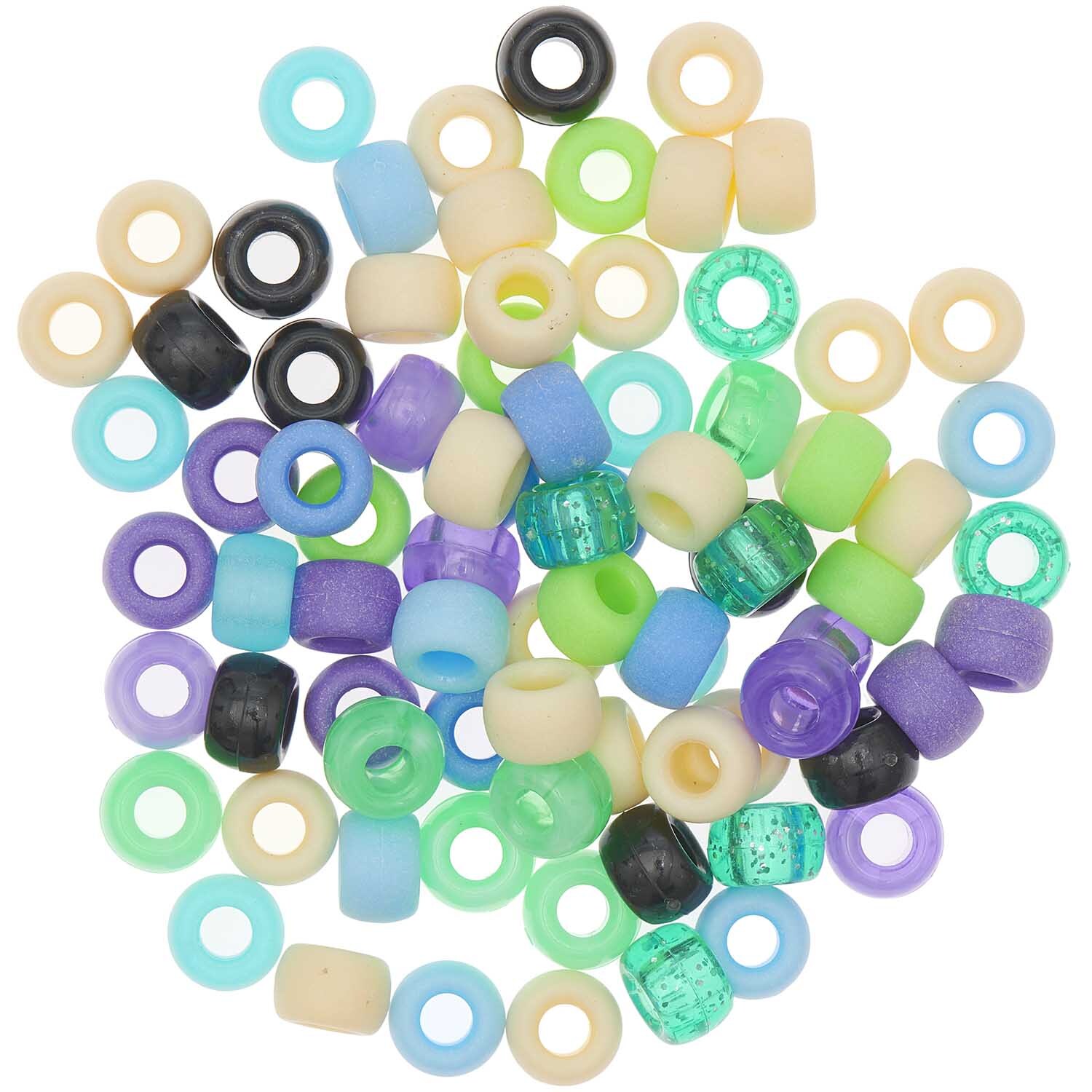Itoshii - Ponii Beads Aqua Mix 9x6mm, 80 Stück. Bunte Perlen in verschiedenen Formen und Farben, ideal für kreative Bastelprojekte.