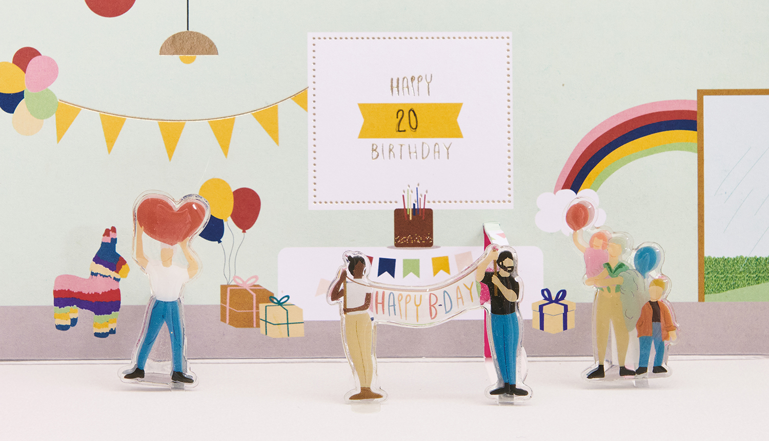 Bastelanleitung Figurico Geburtstag-Karte: Bunte Geburtstagsfeier mit Figuren, Geschenken und Dekorationen.