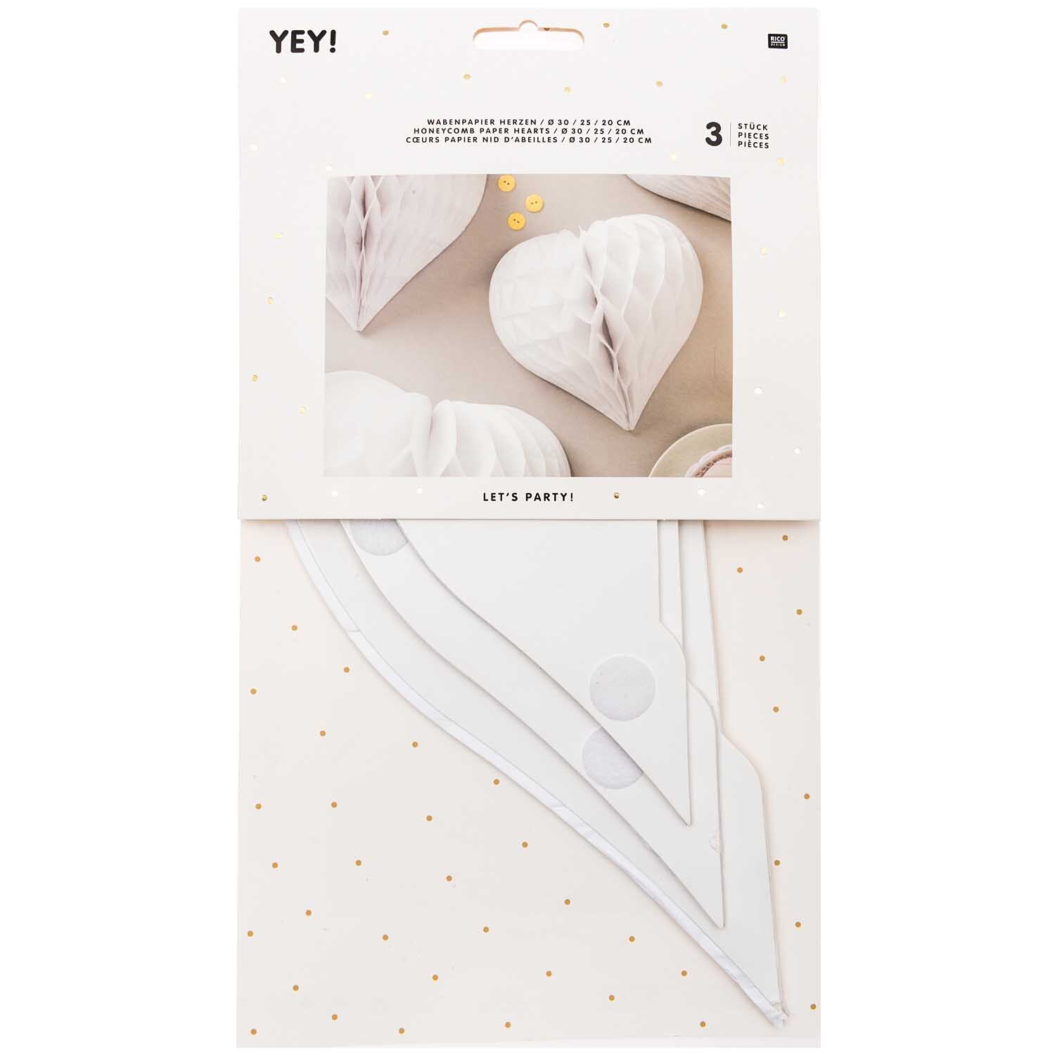 Wabenpapier Herzen weiß 3 Stück von Rico Design. Die Verpackung zeigt dekorative, weiße Papierherzen. Ideal für festliche Anlässe.