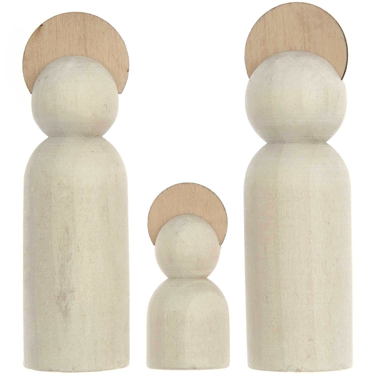 Voll-Holz-Krippen-Figuren: Drei schlichte, naturfarbene Figuren von Rico Design mit runden Köpfen und Heiligenscheinen.