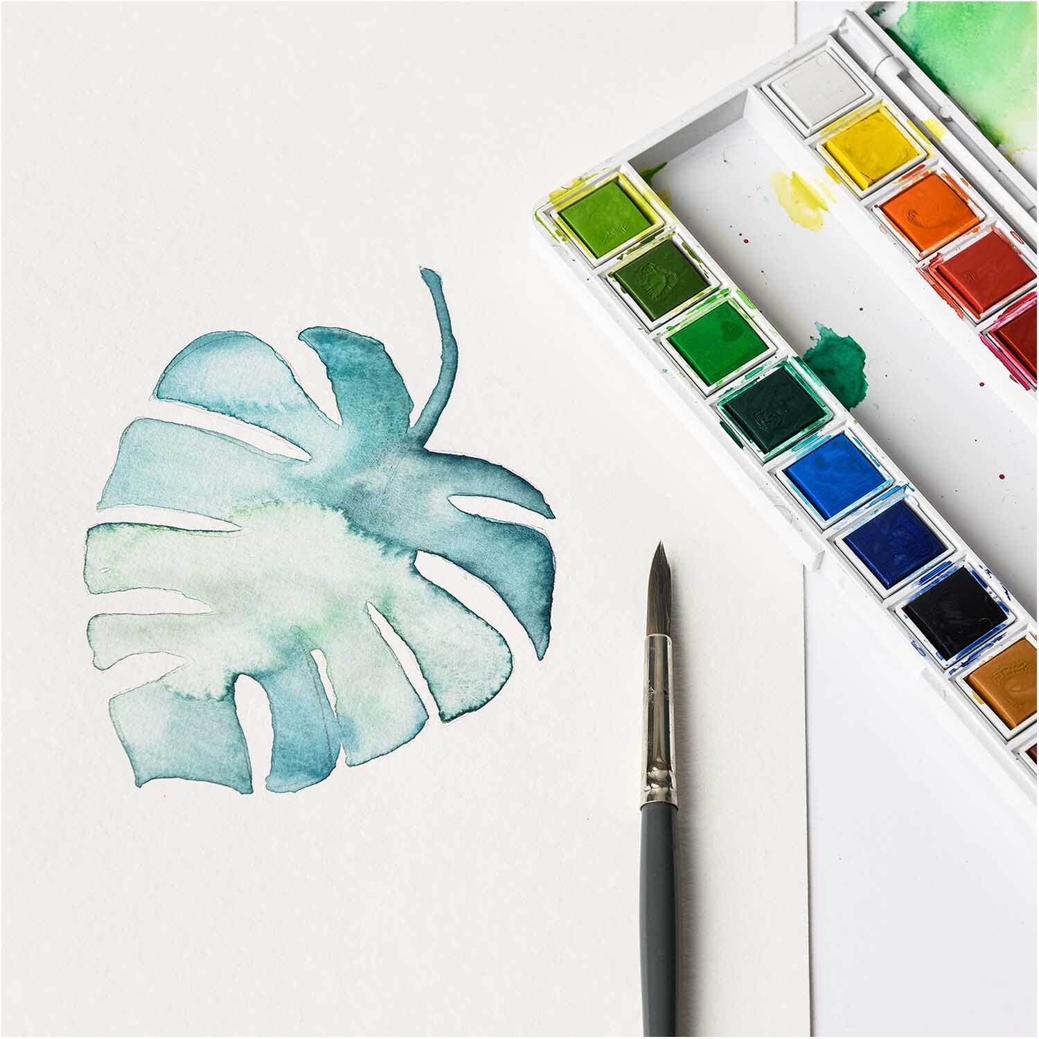 ART Künstler Aquarellfarben 24 Farben: Ein Aquarellset von Rico Design mit Pinsel und Blattmotiv.
