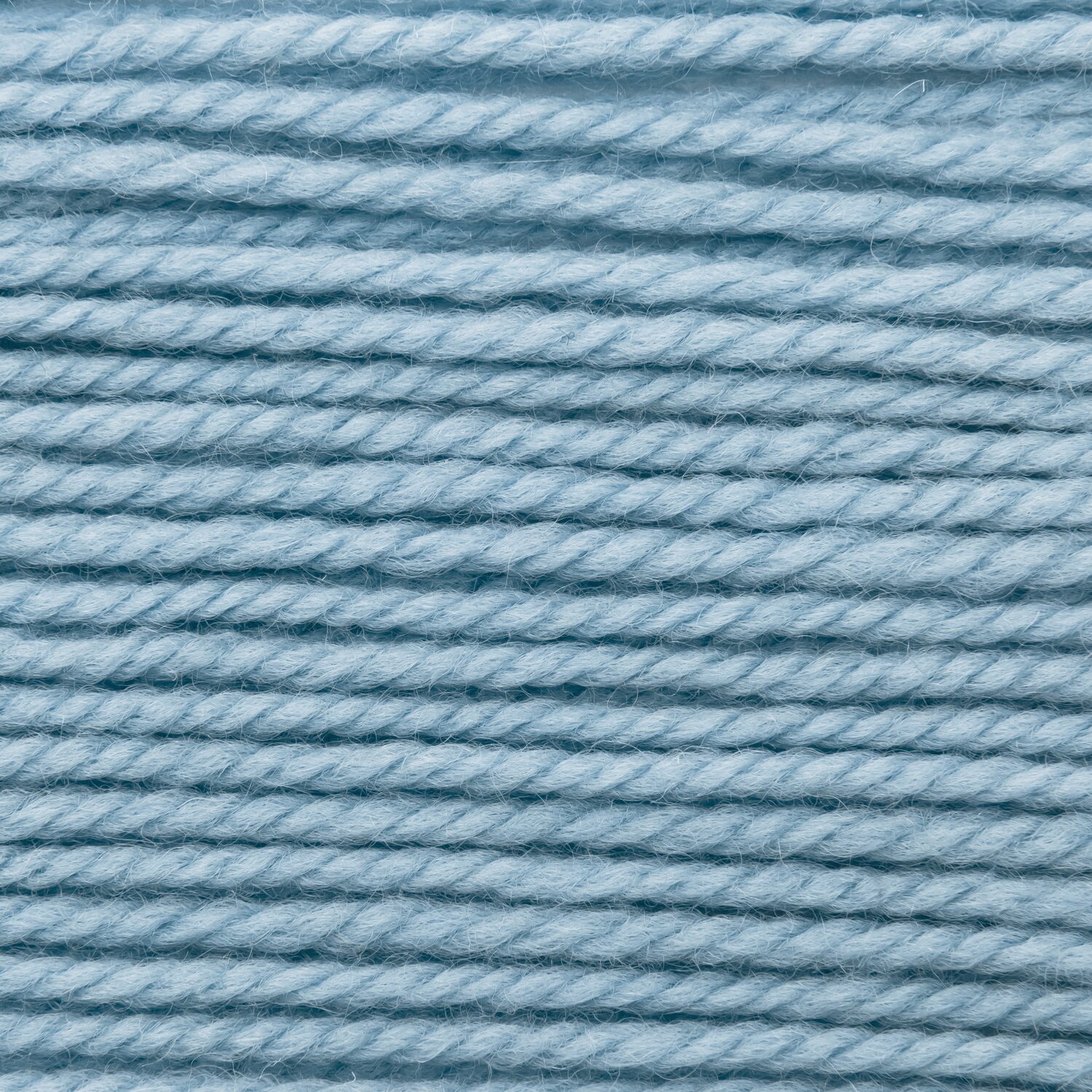Wickelkarte des Garns Essentials Soft Merino aran in der Farbe 023 Himmelblau.