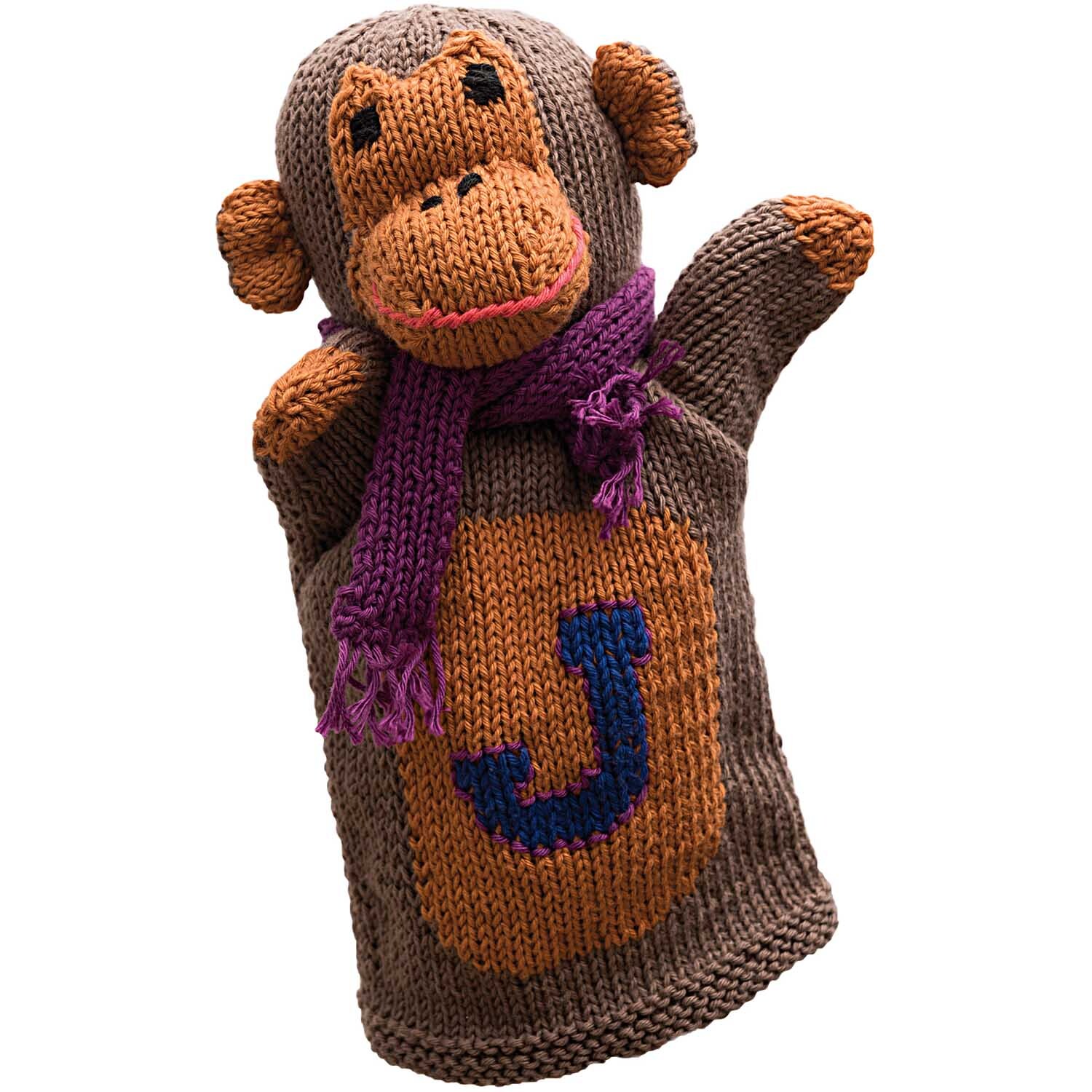 Strickset Handpuppe Affe Jimmy: Handgestrickte Affenpuppe mit lila Schal und braunem Körper von Rico Design.