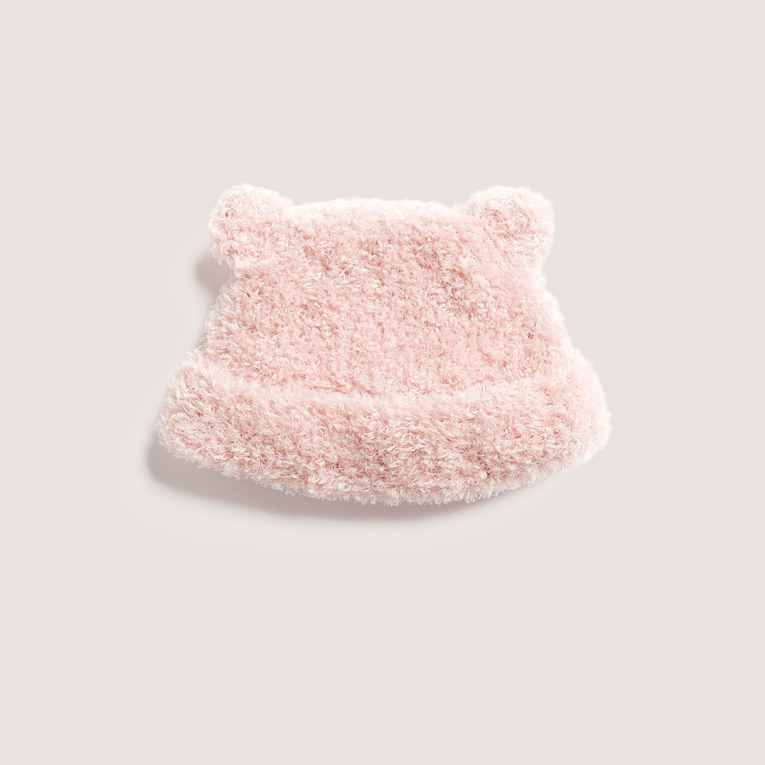 Strickset Mütze Modell 04: Flauschige rosa Mütze mit Bärenohren aus Rico Design Creative Teddy.