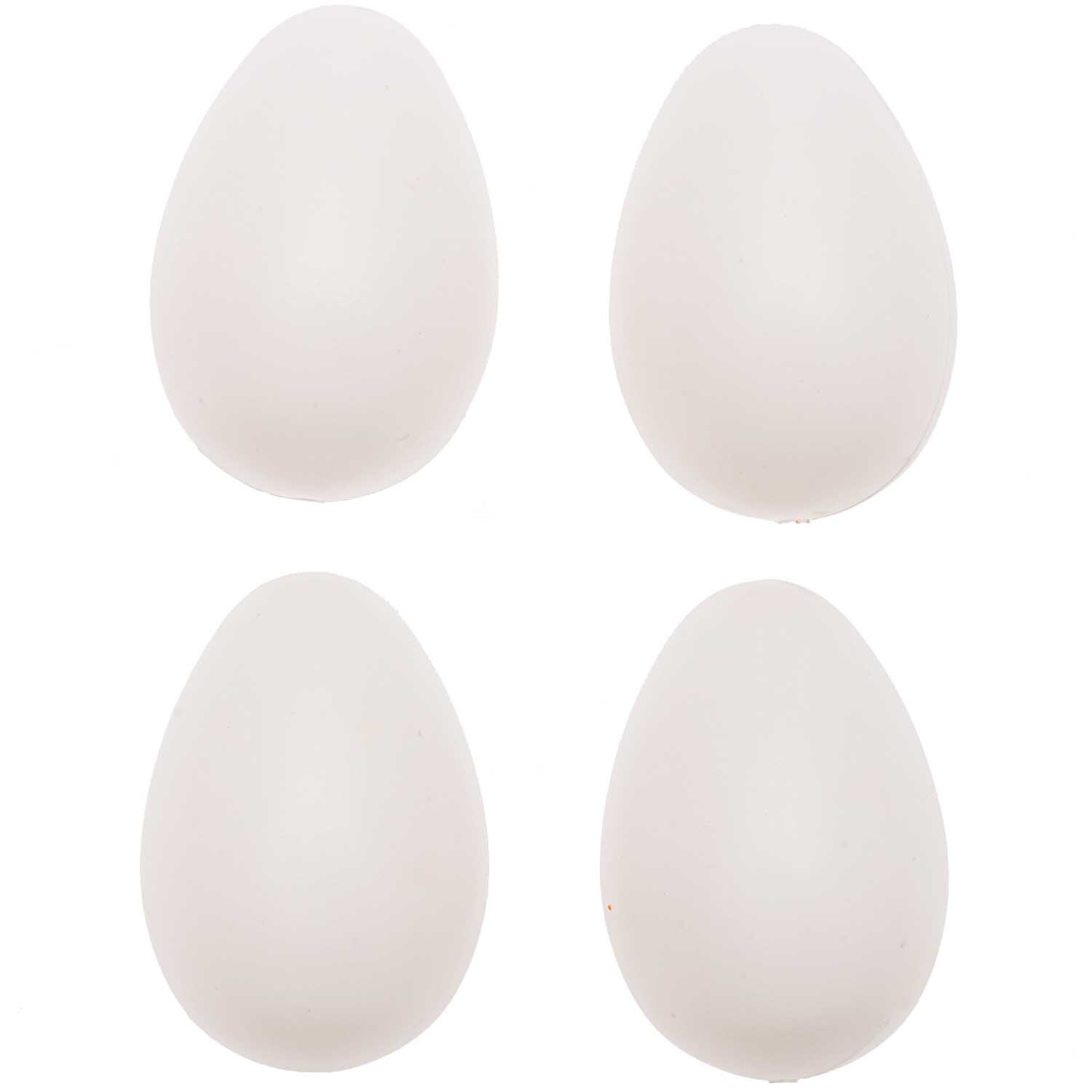 Kunststoffeier 6cm, 20 Stück. Vier weiße Eier auf weißem Hintergrund, ideal für kreative Projekte.