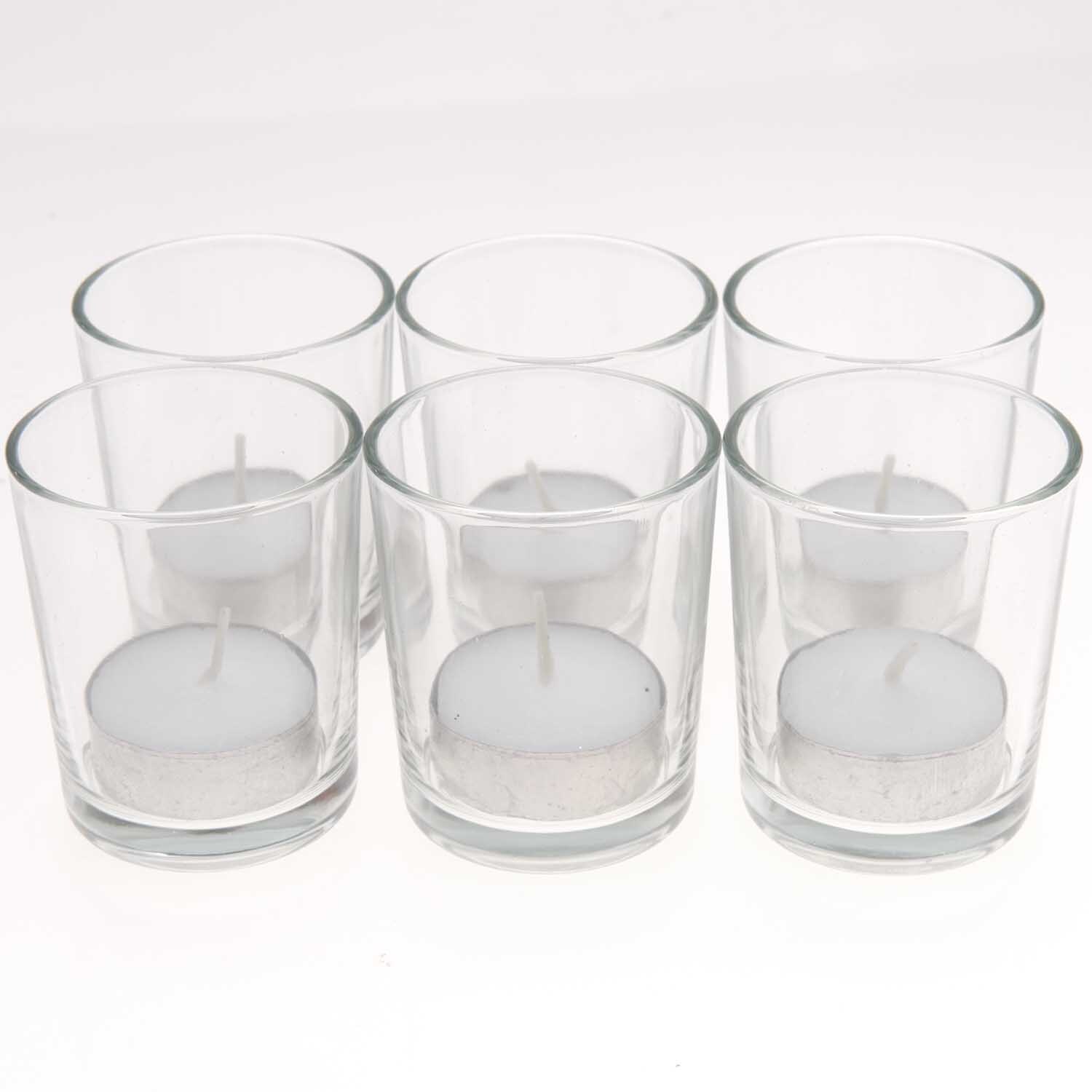 Teelichtgläser klar 5,5x6,8cm 6 Stück von Rico Design: Sechs transparente Gläser mit weißen Teelichtern. Ideal für stimmungsvolle Beleuchtung.