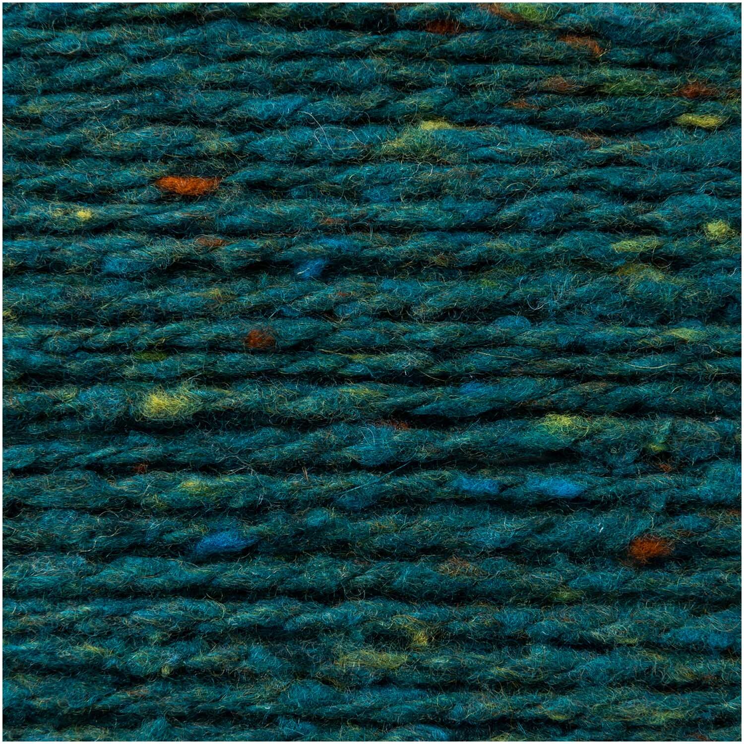 Fashion Modern Tweed aran von Rico Design in Petrol. Nahaufnahme von weicher, strukturierter Wolle.