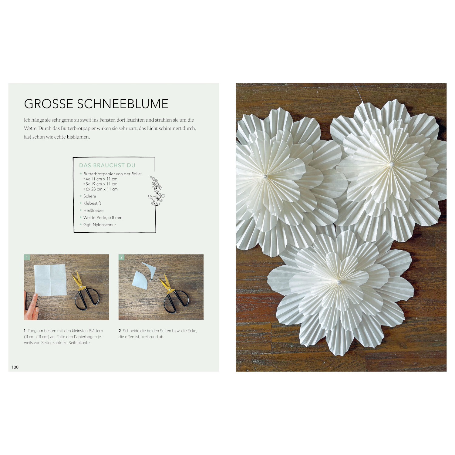 Weihnachtliche Papierdeko: Anleitung zur Herstellung großer Schneeblumen aus weißem Papier.