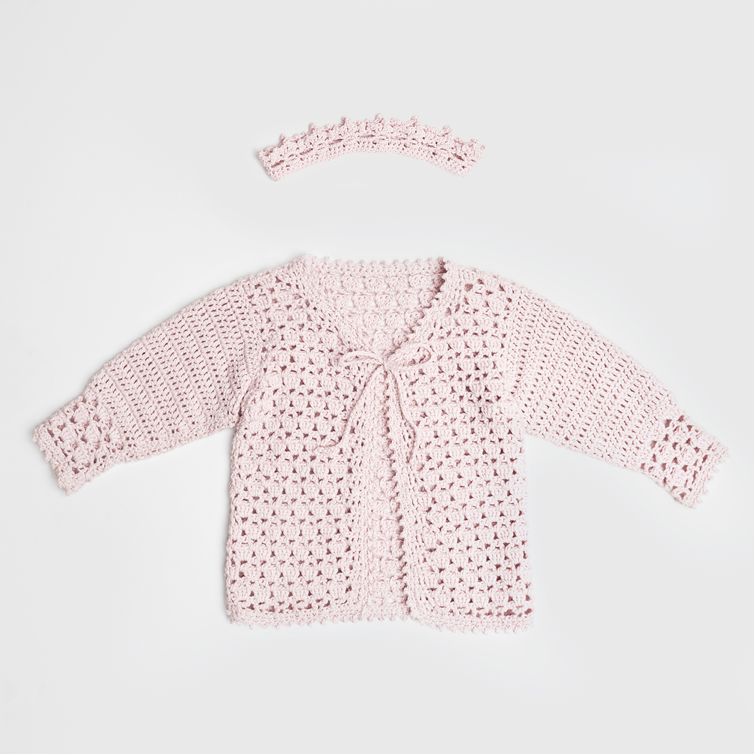 Häkelanleitung Baby-Jacke mit Krone von Rico Design