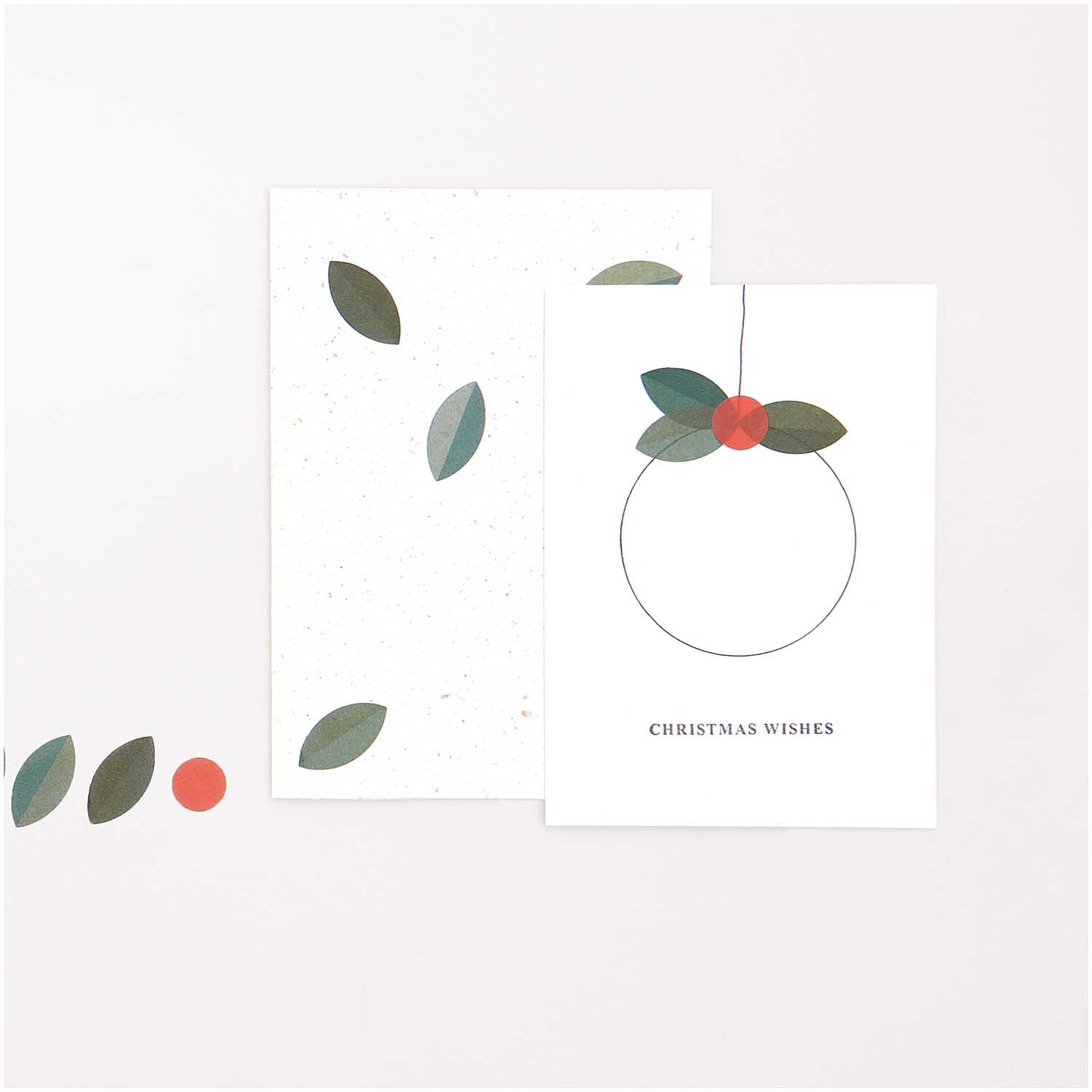 Paper Poetry Washi Sticker Blätter 200 Stück von Rico Design, zeigt Blätter und rote Akzente auf Karten. Ideal für kreative Weihnachtsgrüße.