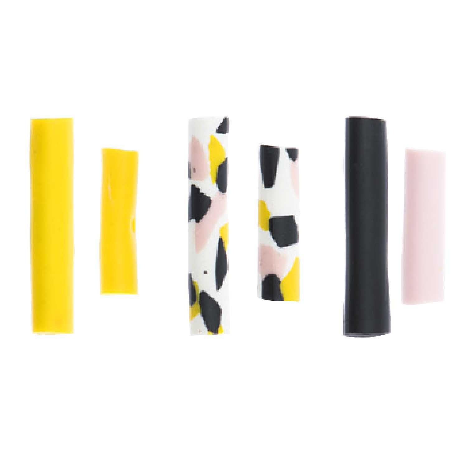 Röhren Mix 6 Stück: Sechs bunte Röhren in Schwarz, Gelb und Weiß von Rico Design auf weißem Hintergrund.