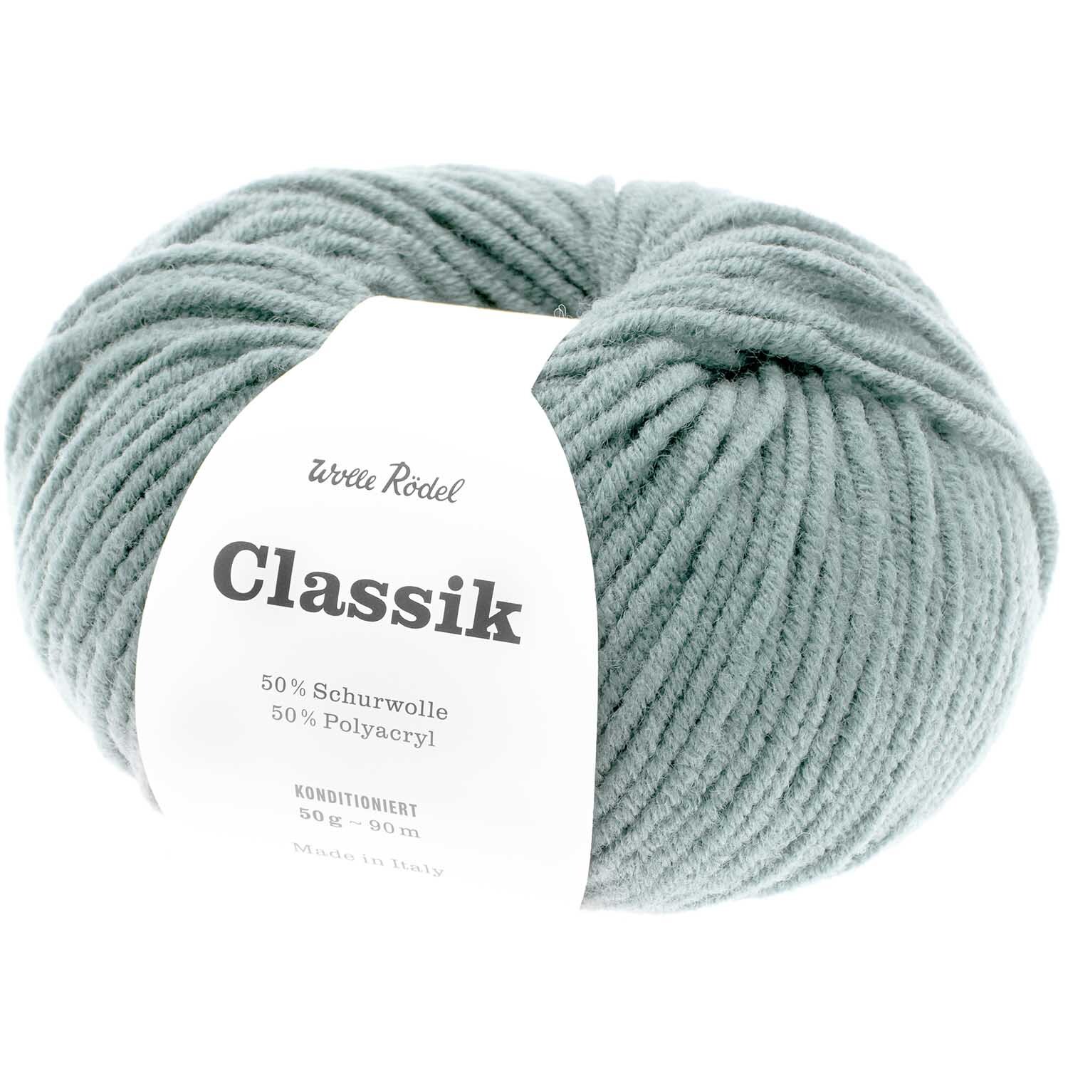Strickset Pullunder Modell 21: Weiches, graues Garnknäuel aus 50% Schurwolle und 50% Polyacryl. Ideal für modische Strickprojekte.