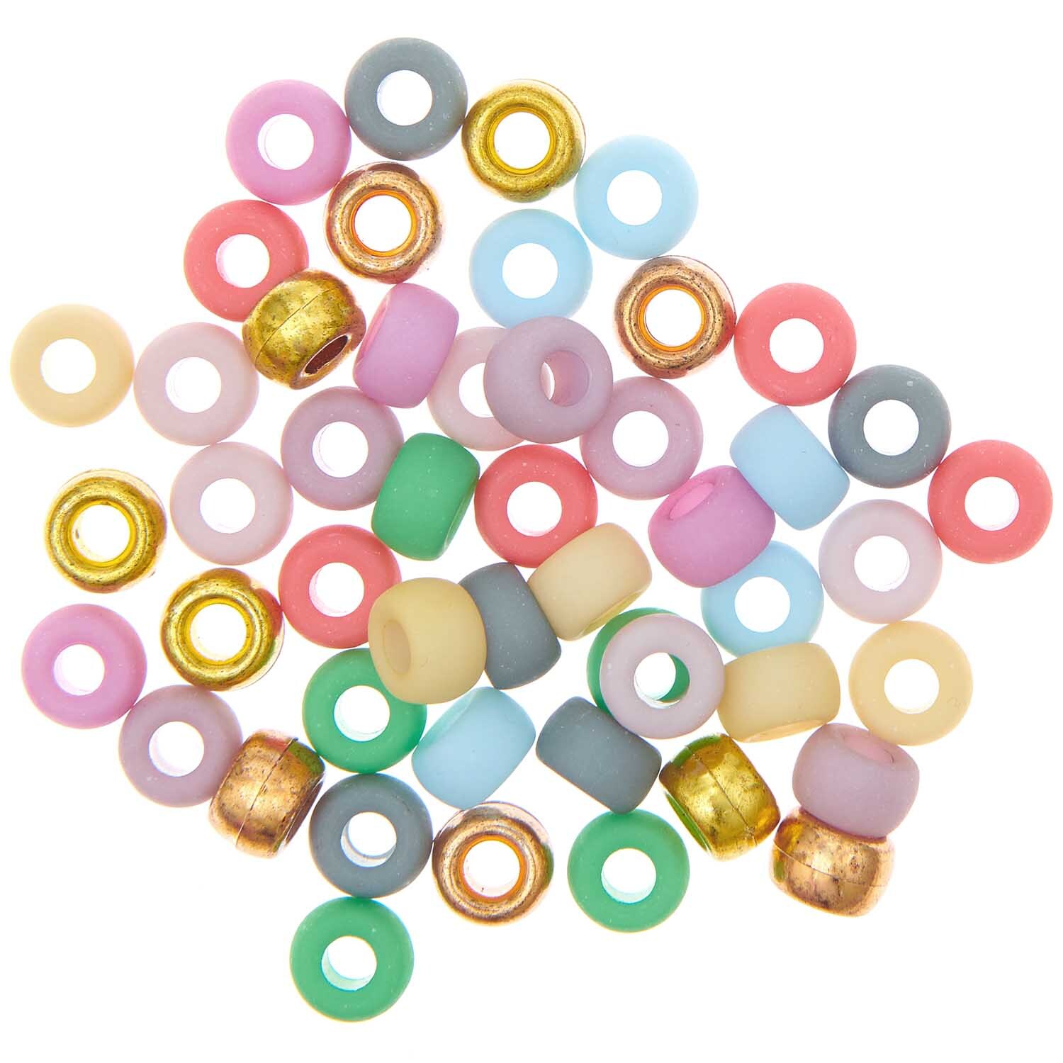 Itoshii - Ponii Beads matt Fashion 9x6mm, 400 Stück. Bunte Perlen von Rico Design in verschiedenen Farben auf weißem Hintergrund.