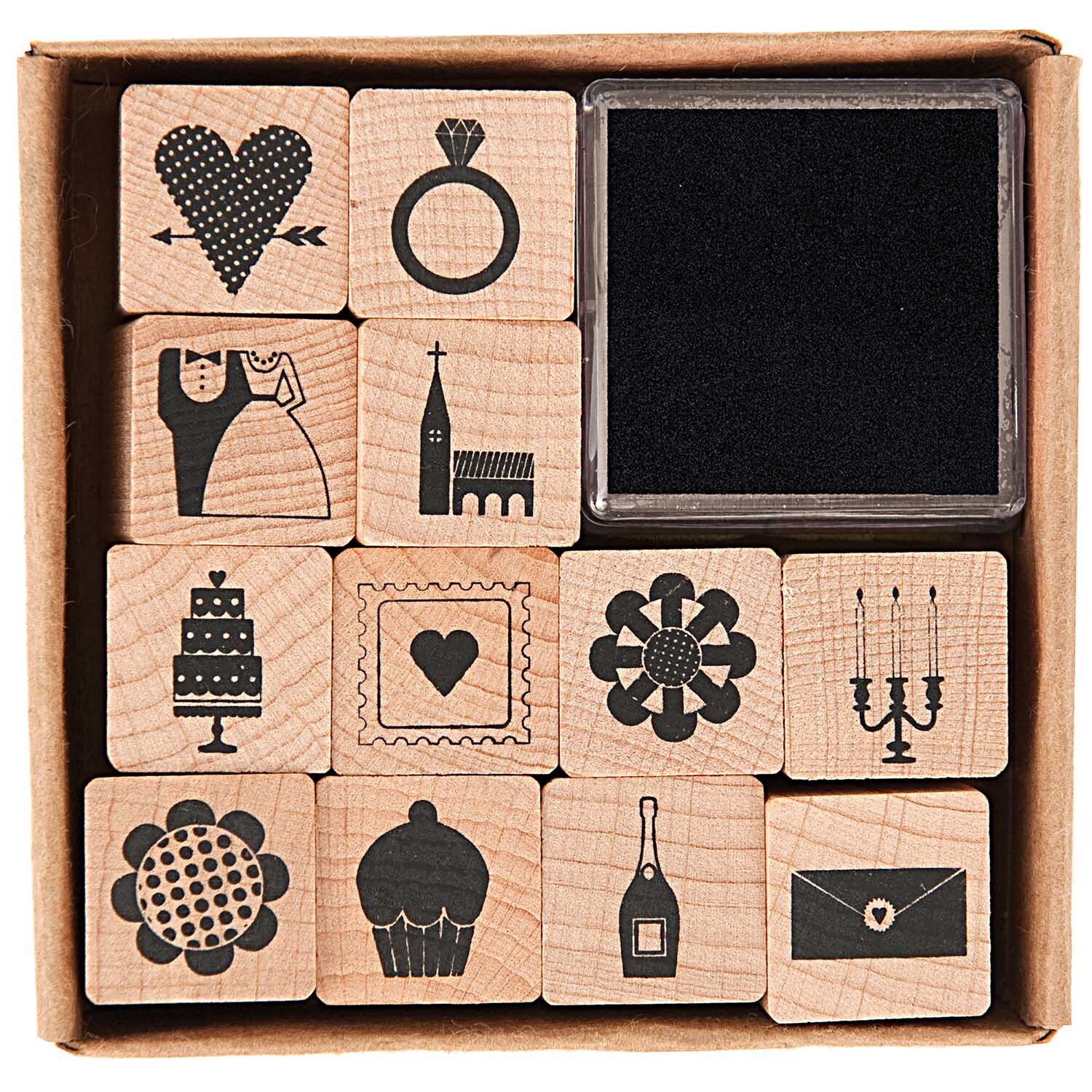 Paper Poetry Stempelset Hochzeit 2x2cm mit 13 schwarzen Stempeln, ideal für kreative Hochzeitsprojekte. Enthält Motive wie Herzen und Ringe.