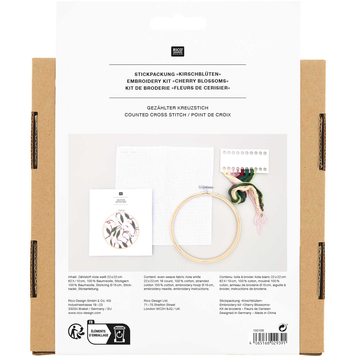 Stickpackung Bild Kirschblüten Ø15cm von Rico Design, zeigt Stickrahmen, Garn und Anleitung auf weißem Hintergrund.