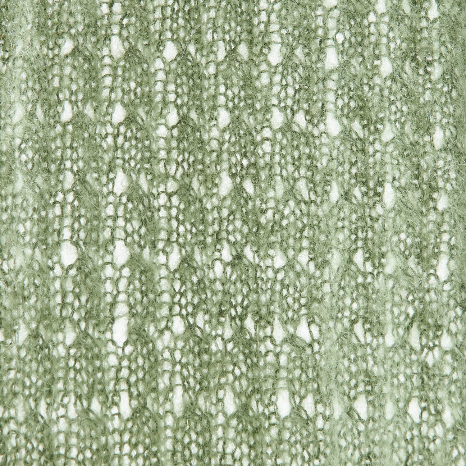 Ein gestricktes Textilmuster in zartem Grün, das die feine Struktur und das Design des Stoffes zeigt. Ideal für Modeprojekte, die Eleganz und Stil betonen.