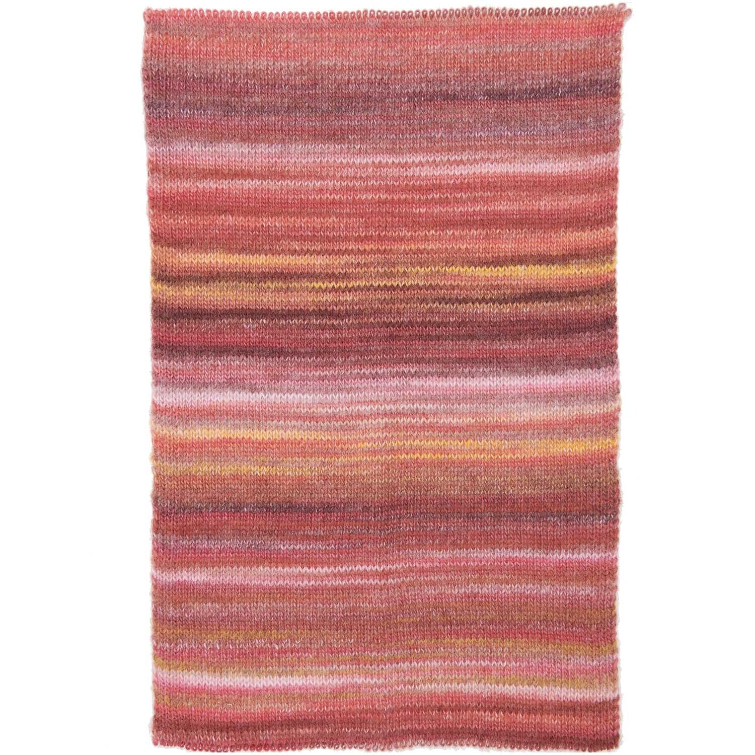 Creative Melange Garzato aran Wonderball: Strickstück in warmen Gelb-Mauve-Tönen von Rico Design, ideal für kreative Projekte.