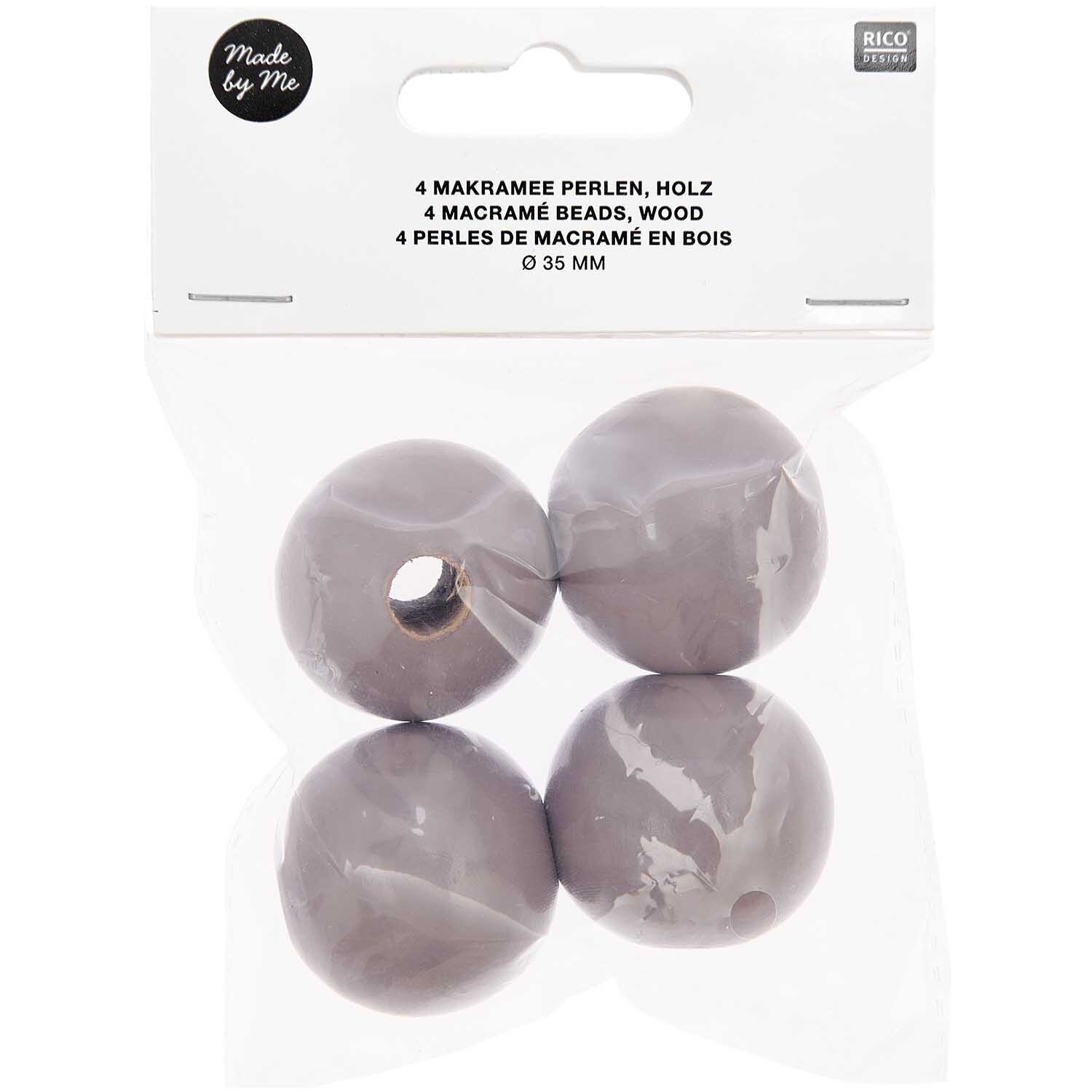 Makramee Perlen Holz grau 35mm 4 Stück von Rico Design in einer transparenten Verpackung.