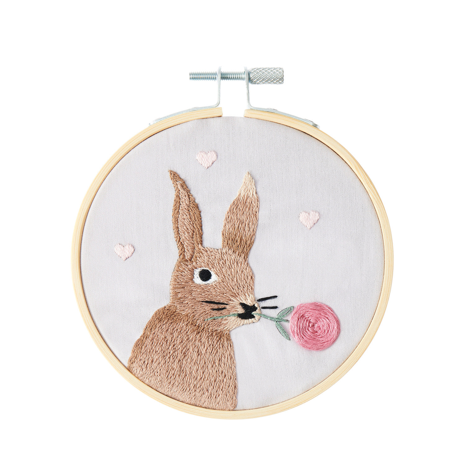 Stickpackung Hase vorgezeichnet: Ein gestickter Hase mit Blume in einem runden Rahmen, Marke Rico Design.
