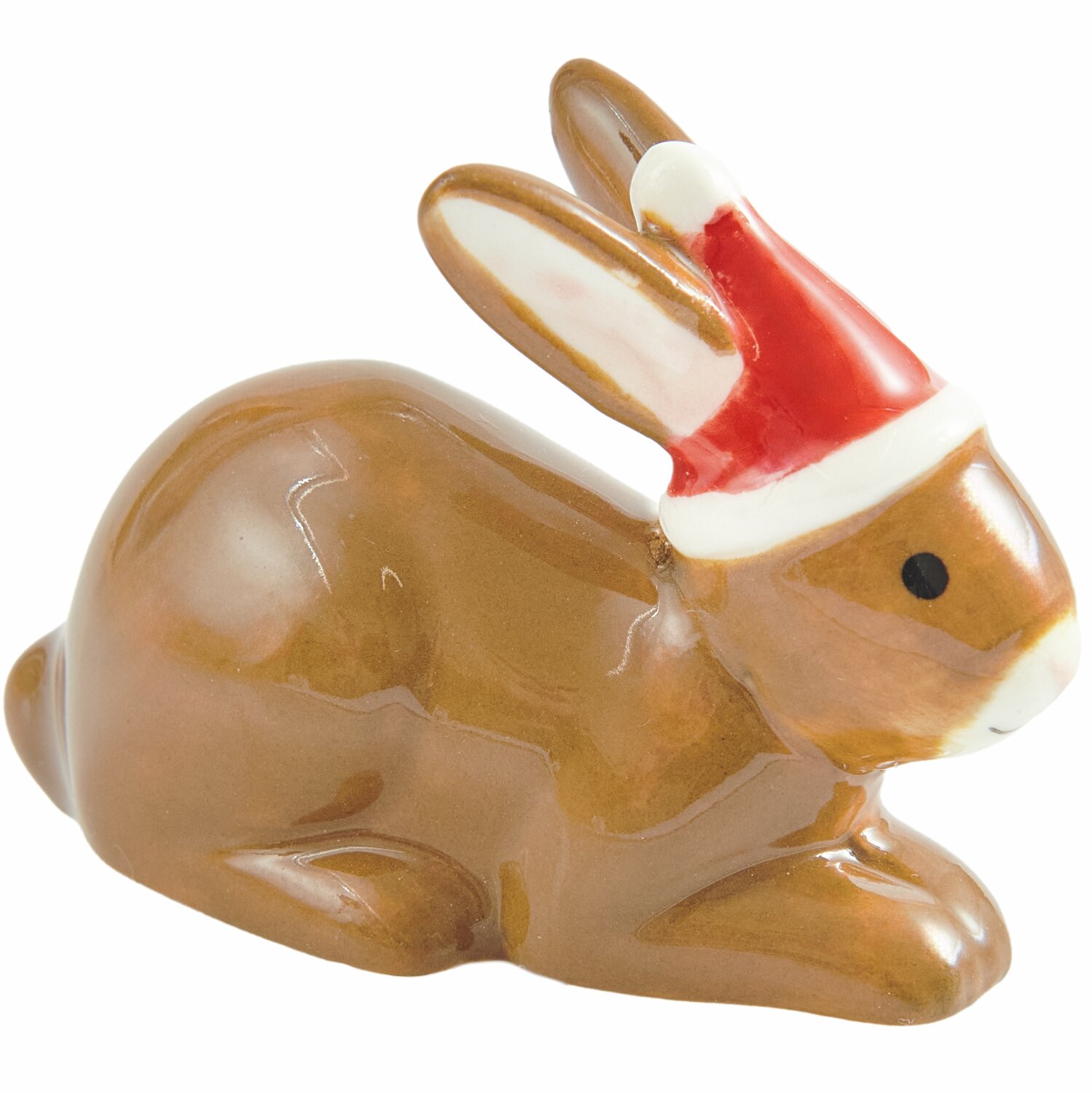Porzellan Hase mit Weihnachtsmütze, braun, von Rico Design. Maße: 3,3x4,7x2,2cm. Ideal als festliche Dekoration.