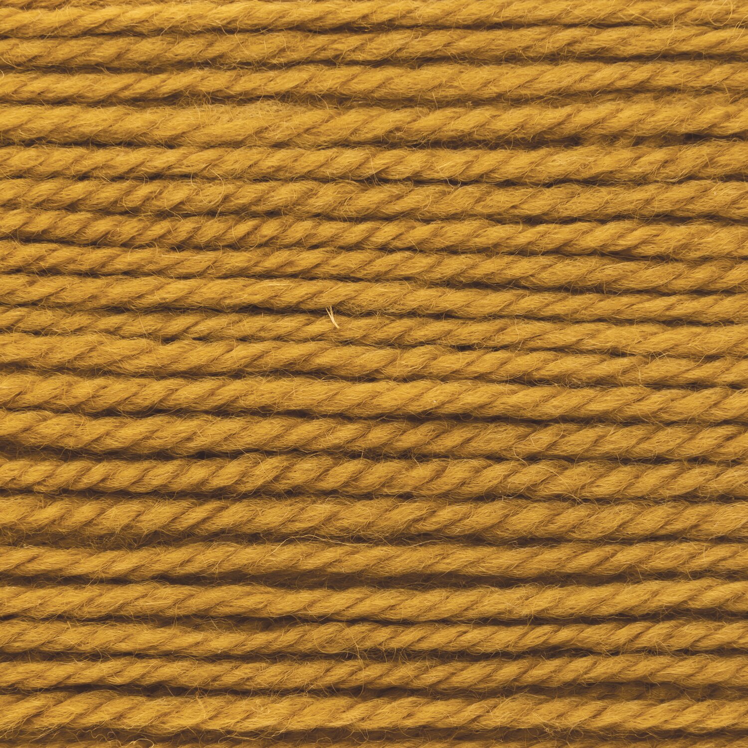 Wickelkarte des Garns Essentials Soft Merino aran in der Farbe 001 Senf.
