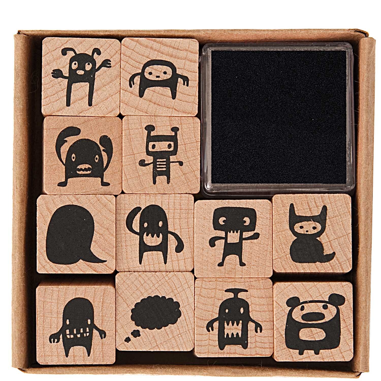 Paper Poetry Stempelset Monster 2x2cm mit 13 schwarzen Stempeln in verschiedenen Monsterformen von Rico Design.