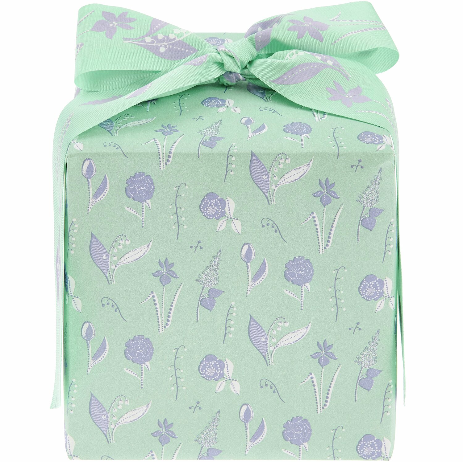 Geschenkpapier Blumenwiese: Frühlingsblumenmuster auf grünem Hintergrund, dekorativ verpackt.