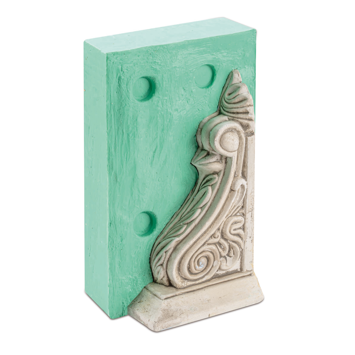Abformsilikon von Glorex, 2x500g: Grünes Silikon mit detaillierter Form eines dekorativen Reliefs. Ideal für präzise Abformungen.