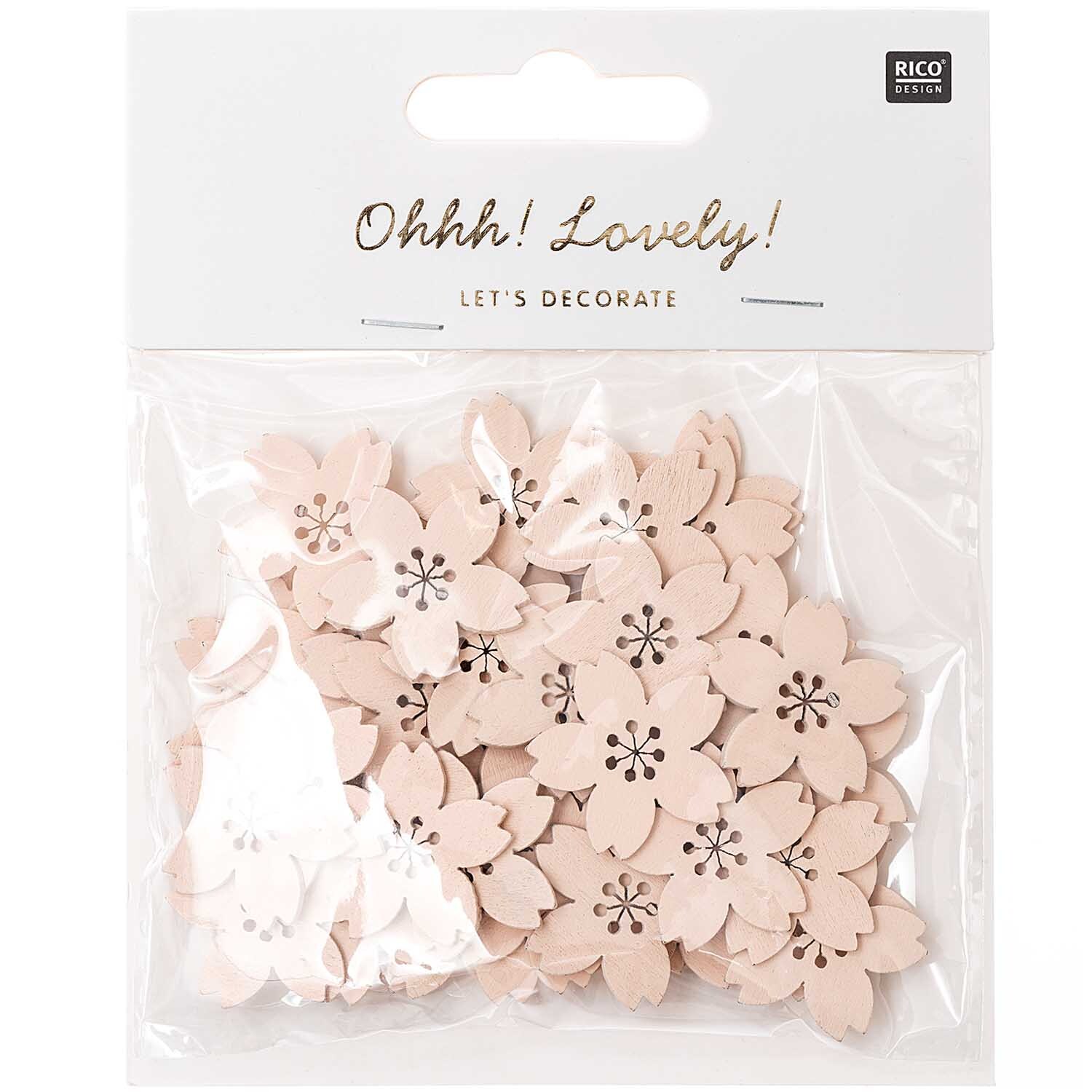 Holzstreu Kirschblüte von Rico Design: Puderfarbene Blüten in einer transparenten Verpackung.