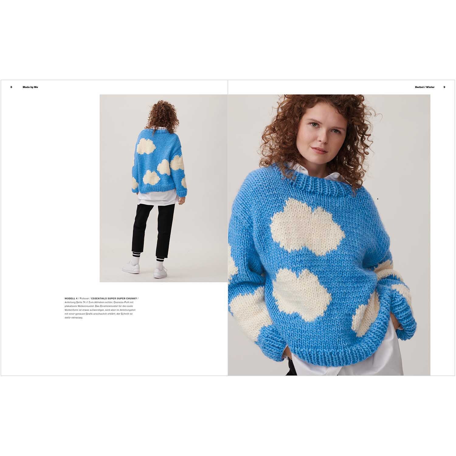 Made by Me Handknitting Nr.13 Herbst-Winter: Frau trägt blauen Pullover mit weißen Wolken von Rico Design.