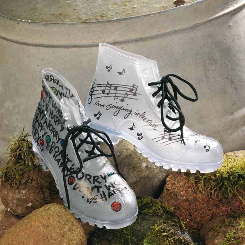 3000 Permanentmarker 1,5-3mm von edding: Transparente Stiefel mit Musiknoten und Schriftzug, dekoriert mit bunten Markierungen auf Steinen.