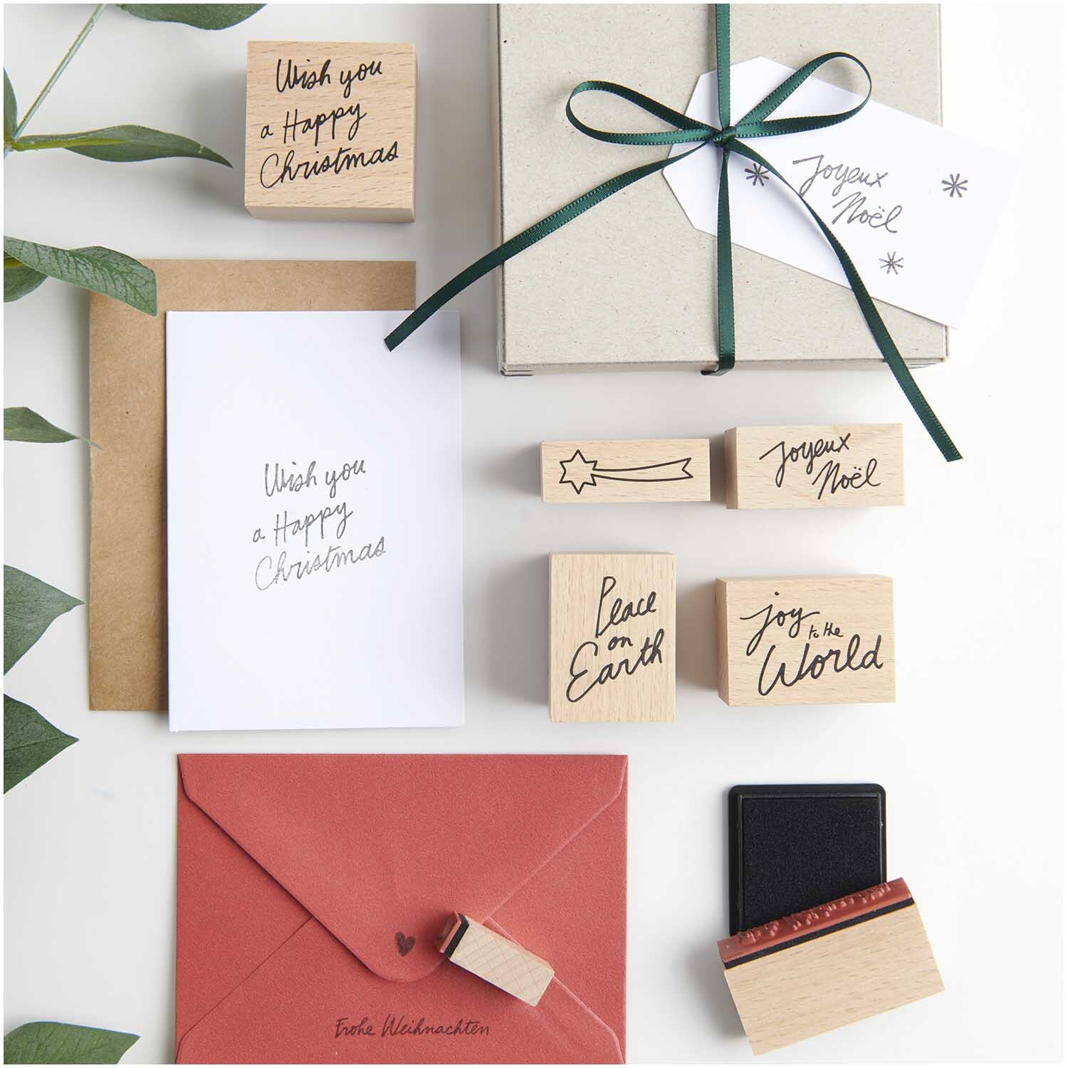Paper Poetry Stempelset Handlettering: 16-teiliges Set mit Grußkarten und Stempeln für kreative Weihnachtsbotschaften.